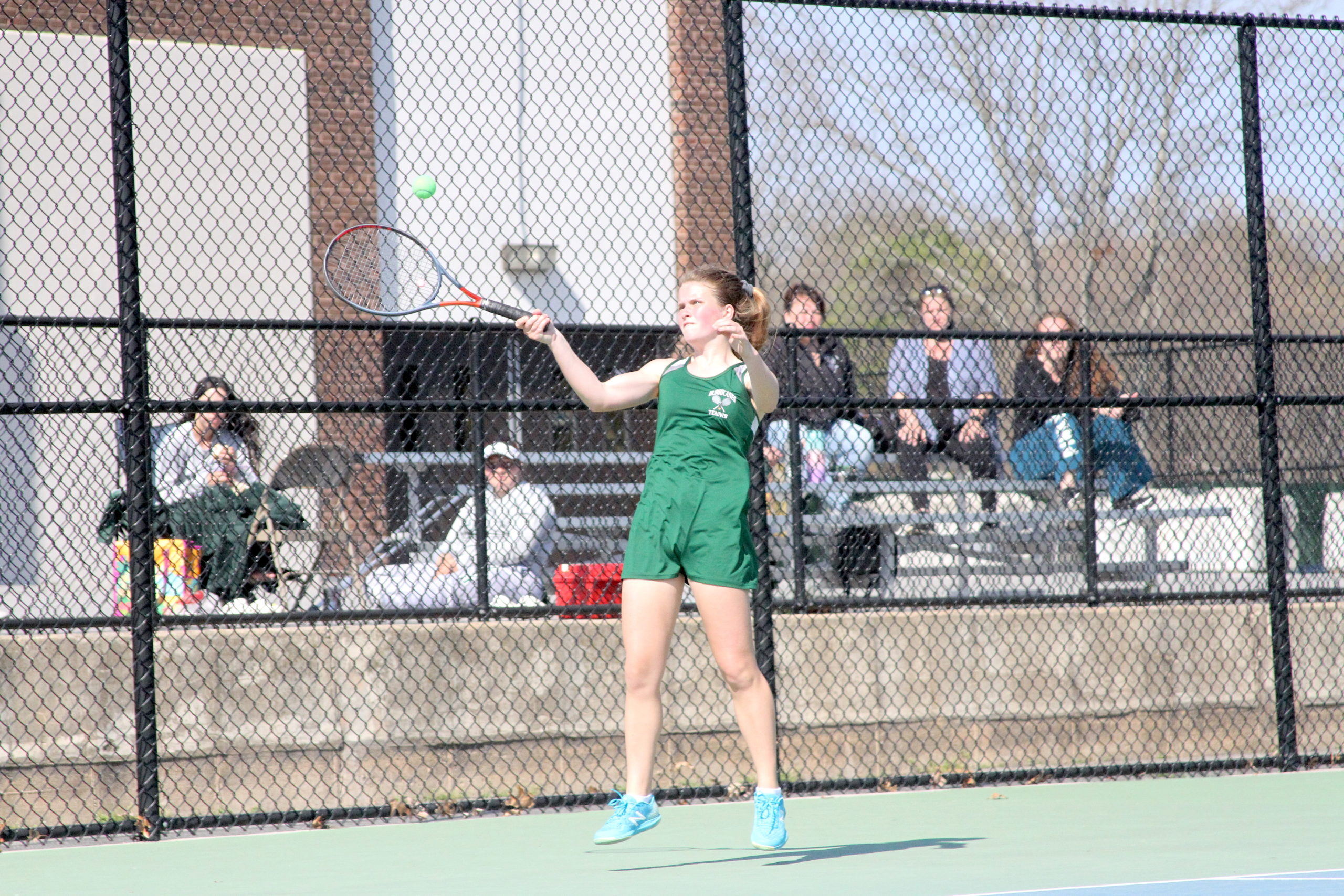 Westhampton Beach junior Katelyn Stabile keeps the volley going against East Hampton in the Division IV doubles finals on Tuesday.