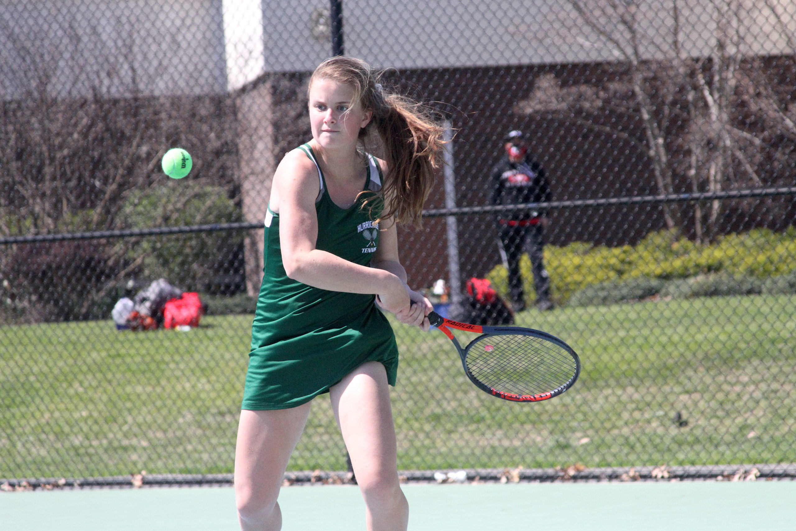 Westhampton Beach junior Katelyn Stabile keeps her eyes on the ball in her doubles team's quarterfinal matchup.