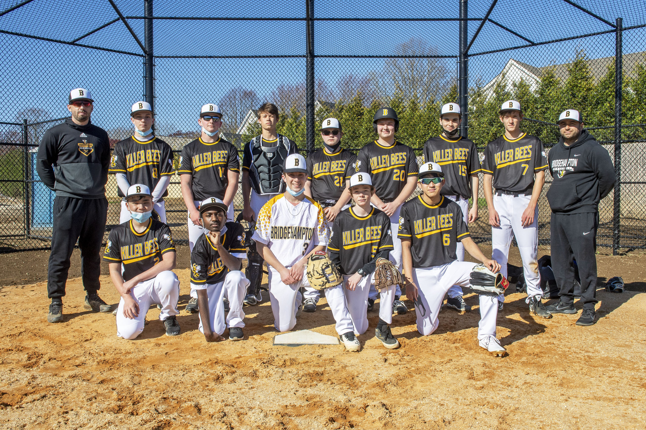 Members of the first Bridgehampton High School baseball team in four decades began practicing this week for an inaugural junior varsity season. Front row, from left: Hugo Kapon, Neo Simmons, Kris Vinski, Will Husband, and Yudai Morikawa. Second row, from left, Coach Lou Liberatore, Scott Vinski, Dylan Fitzgerald, Milo Tompkins, Shawn Gnyp, Jack Boeshore, Evan Buccigross, Eli Wolf, and assistant coach Michael DeRosa. Tyler Fitzgerald, Naiven Mabry, Kaylee Sanchez, and Leah Meyerson are missing. MICHAEL HELLER