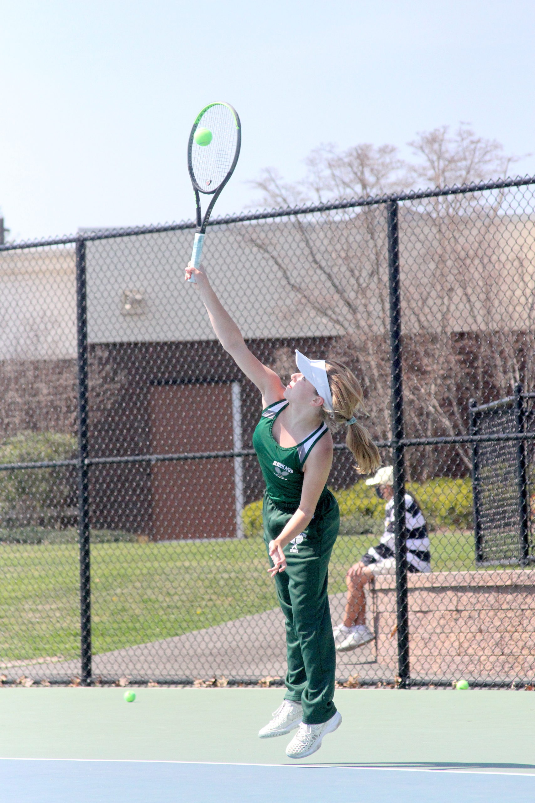 Westhampton Beach eighth-grader Matilda Buchen serves the ball in the Division IV singles finals on Tuesday.