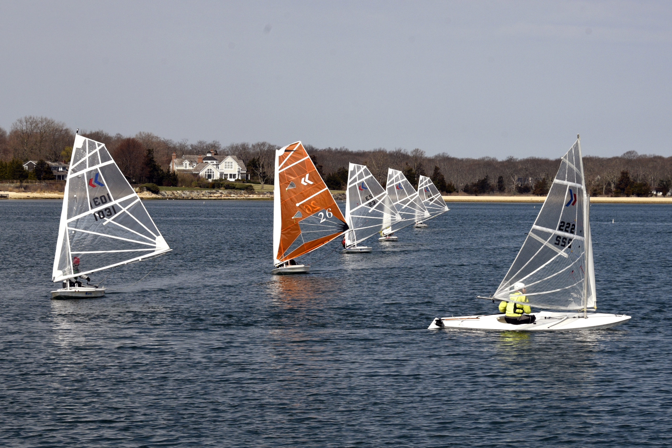 From left; Rachel Beardsley (#1031), Jullian Shapiro (#26-the latest of the MK sails; this one cut by Scott Sandell on his kitchen floor), Gloria Franzee (#23), Marty Knab, Brenna Gilroy (#39) and Mark Webber (#222).
