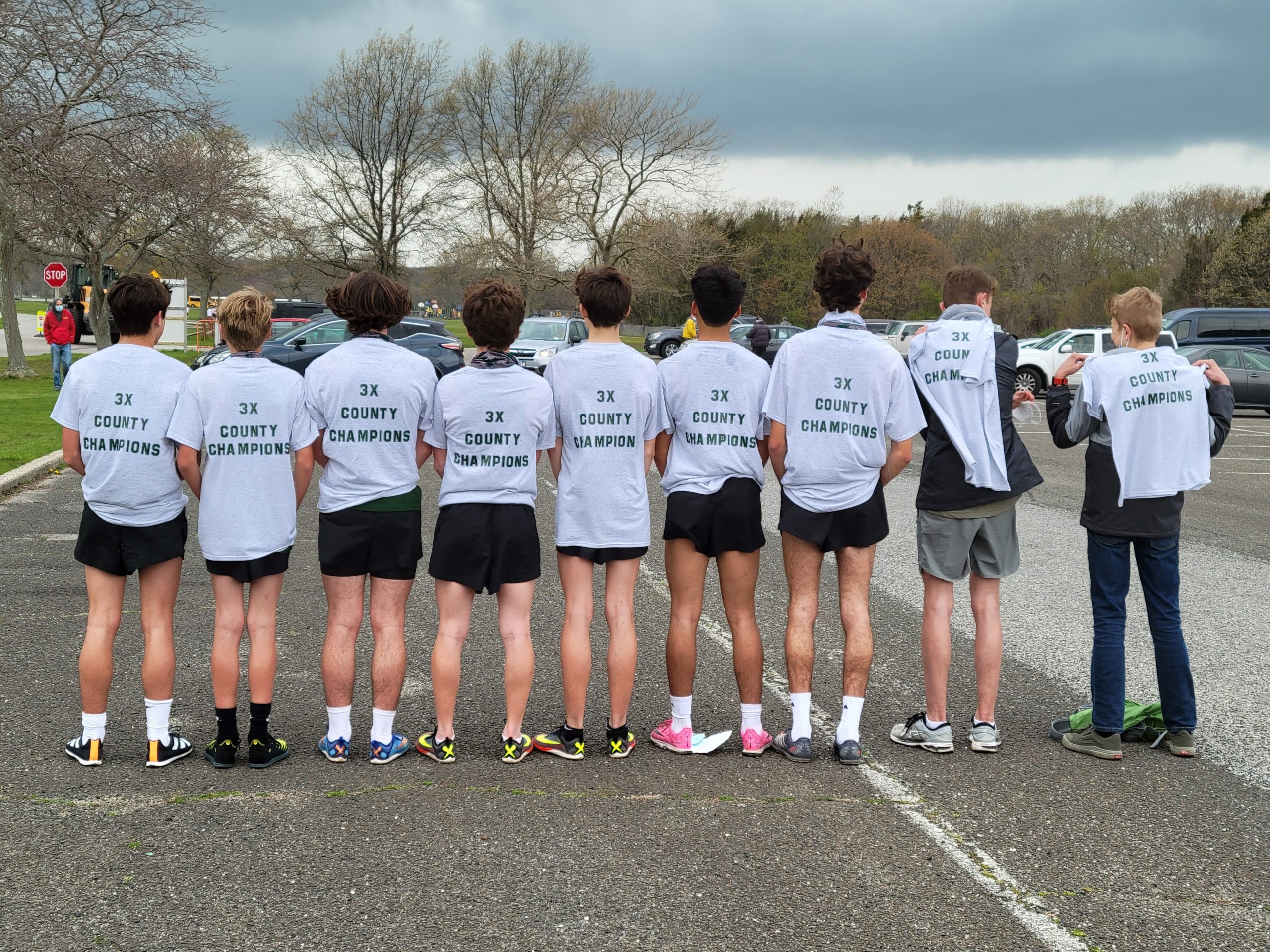 The shirts say it all; the Westhampton Beach boys cross country team won the Suffolk County Class B title for the third consecutive season last week.