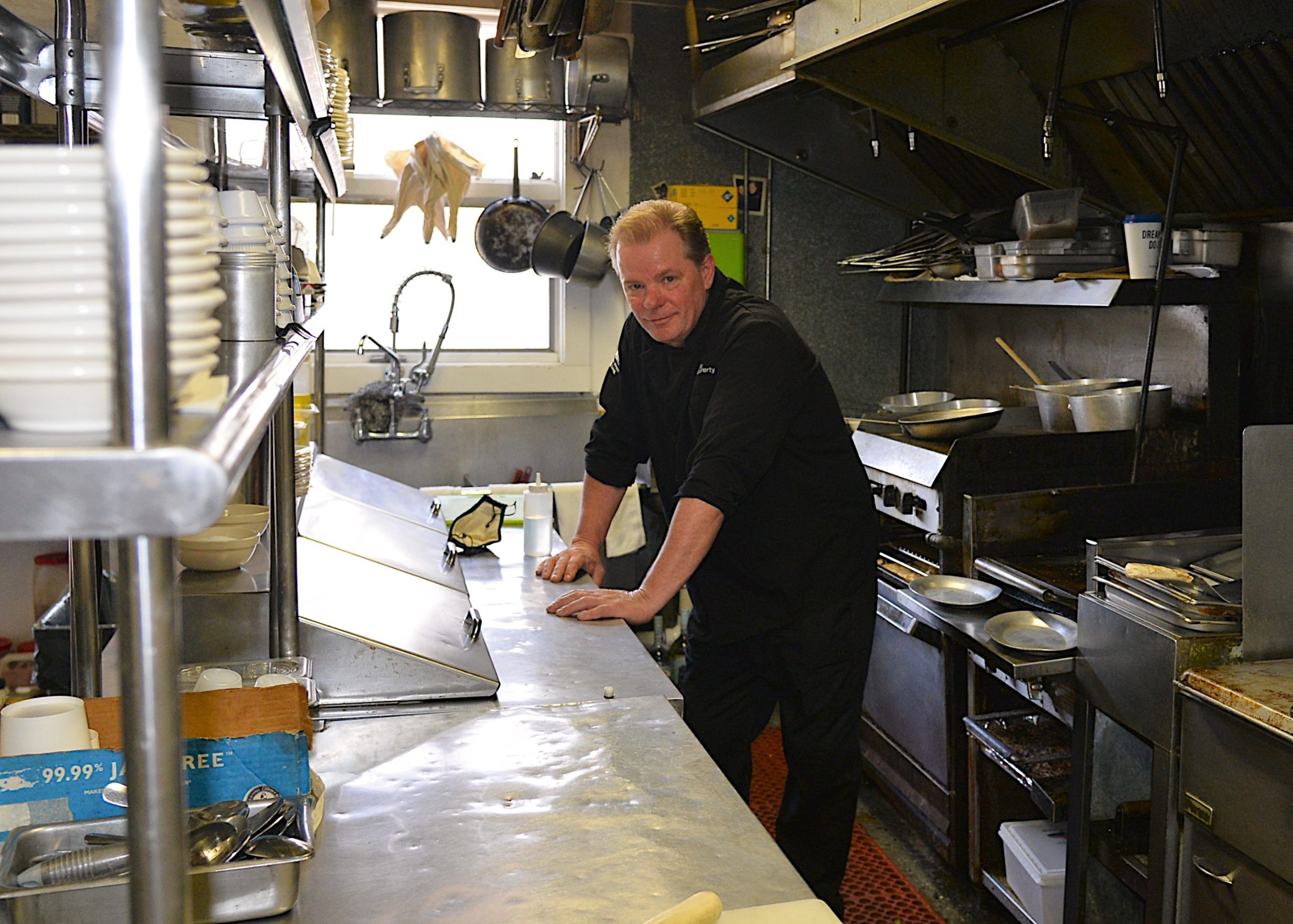 Chef Ken Rafferty of the Springs Tavern, where the owners increased kitchen staff, expanded their menu offerings and retooled the website to compensate for the increased demand for easy-access take-out dinners over the winter.