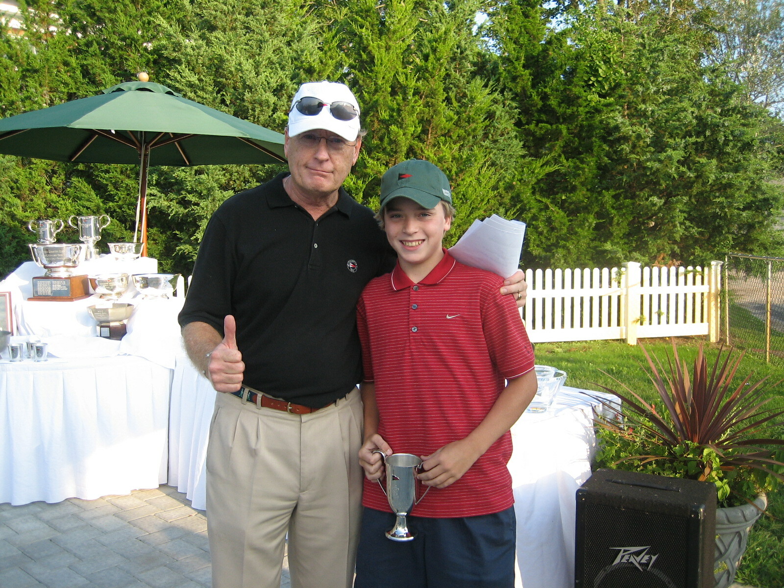 C.J. Andrews, with head golf pro Bobby Jenkins, when he won the Junior Club Championship at Westhampton Country Club in September 2006.