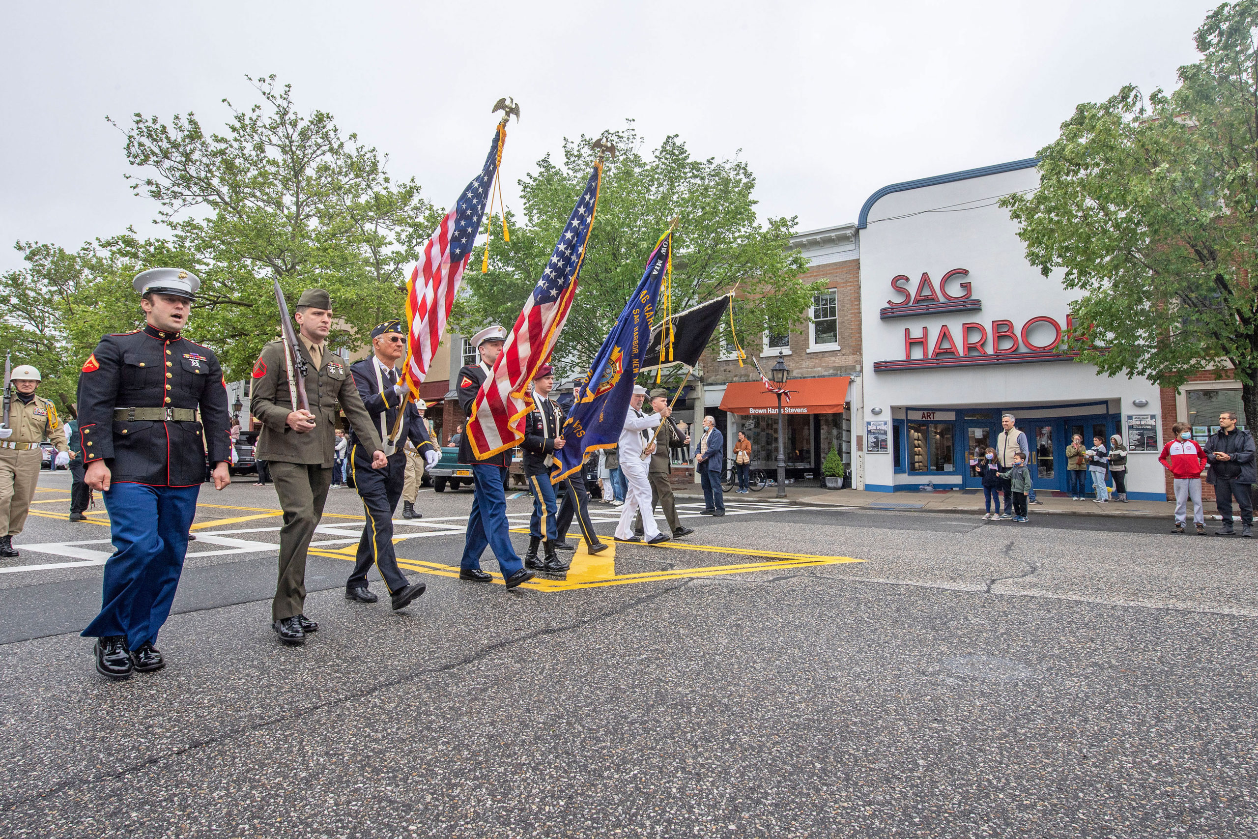The parade makes its way down Main Street during  2021 Memorial Day ceremonies in Sag Harbor on Monday.   MICHAEL HELLER