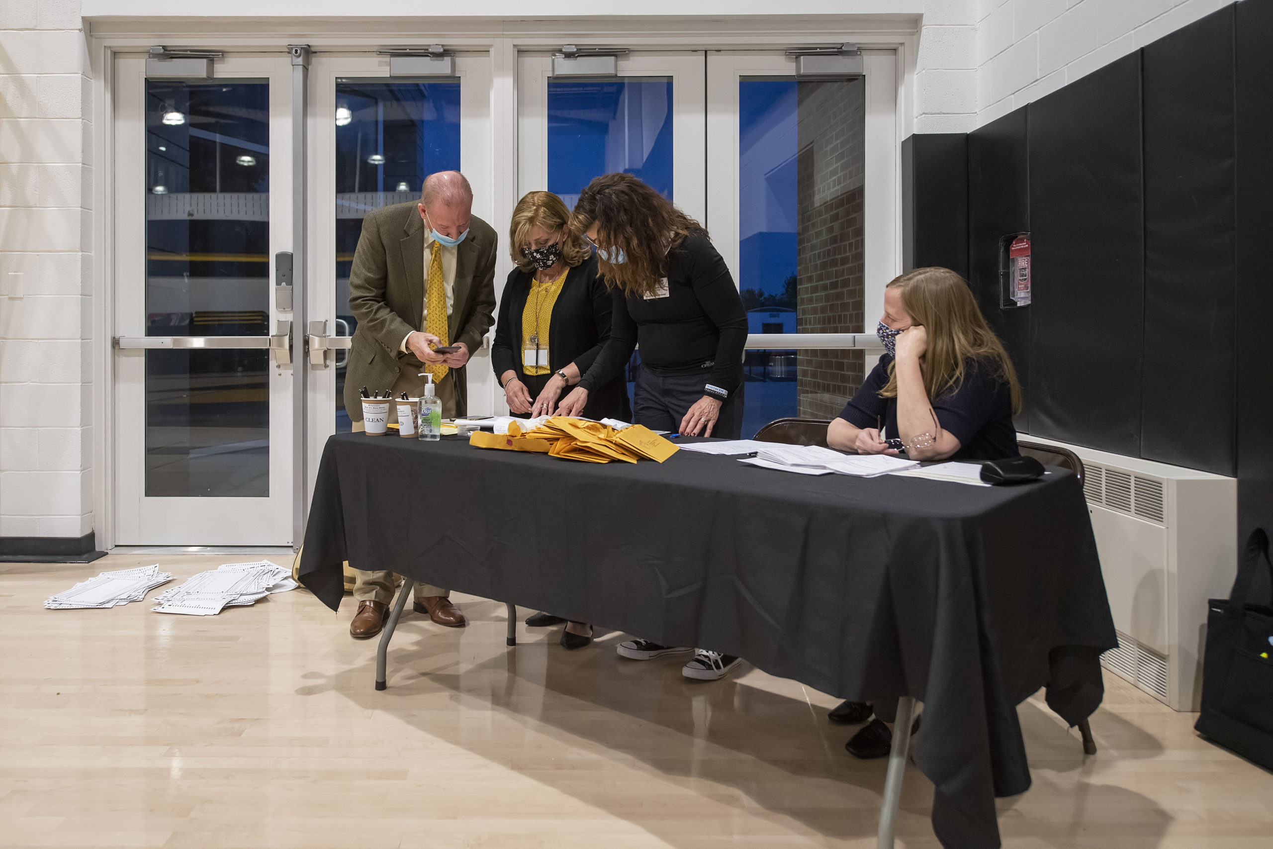 Bridgehampton School District officials review the count of ballots in Tuesday nights budget vote, which fell just two votes short of approval.