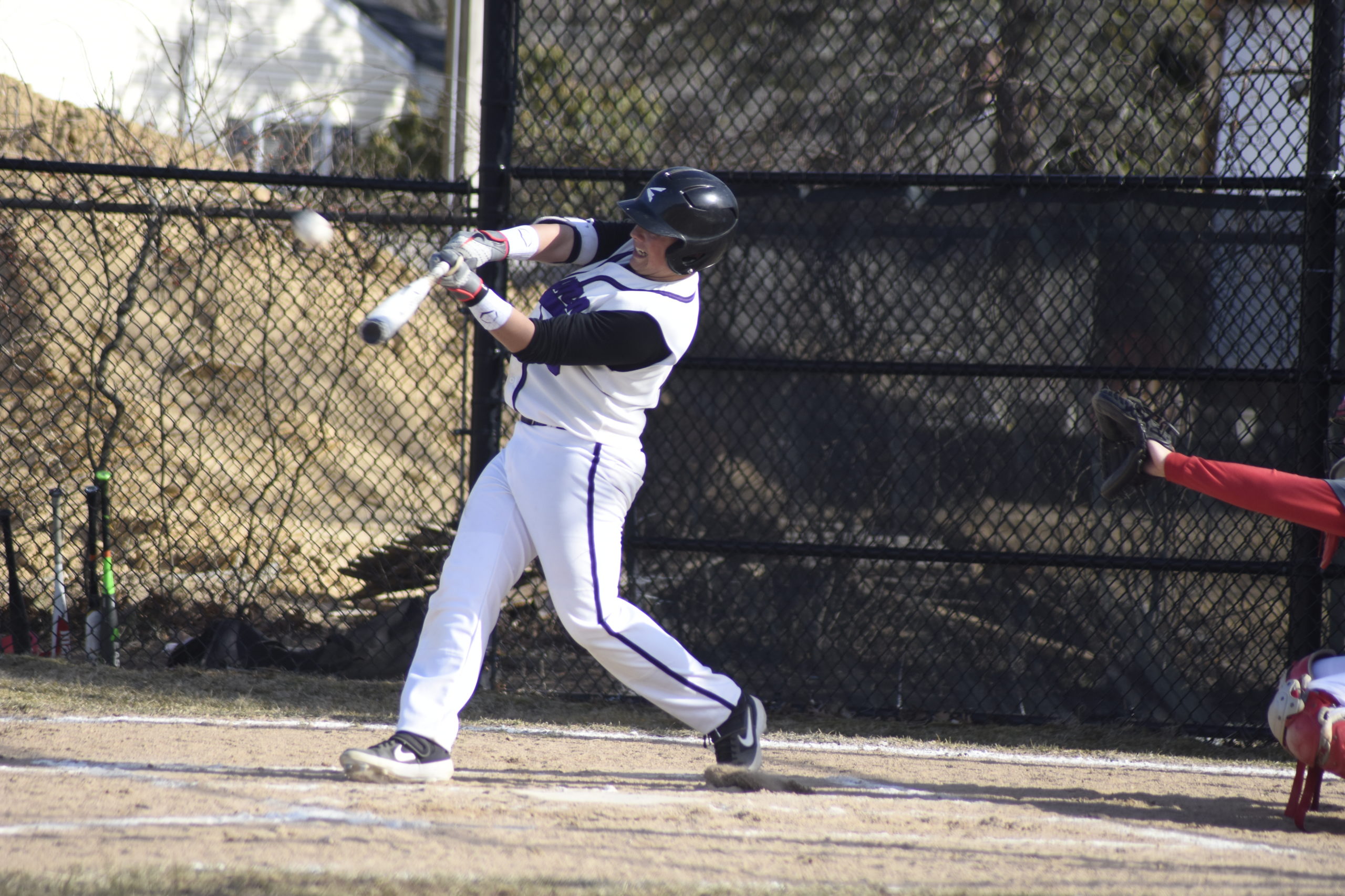 Jordan Adelson launches a pitch in a game during 2019.