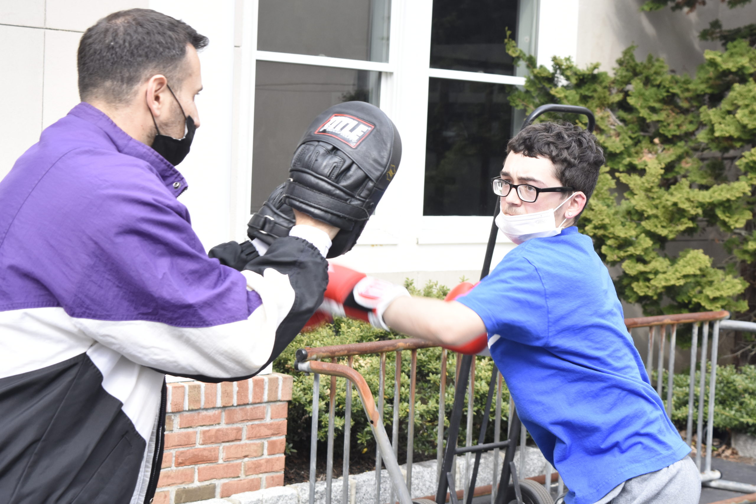 Tim McCarthy takes a few punches at Christopher DeRosa.