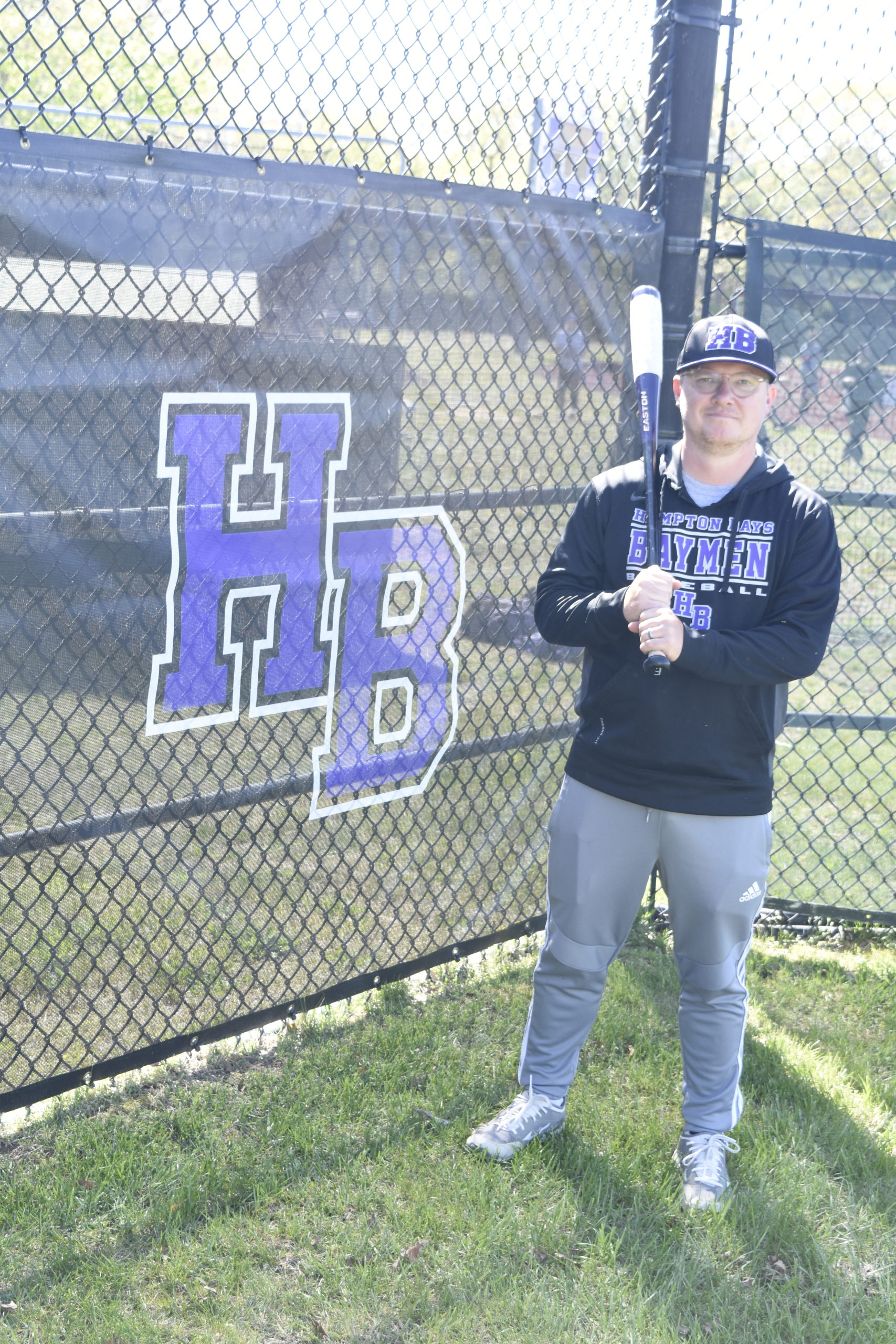 John Foster is the new head coach of Hampton Bays varsity baseball, the same team he won a county title with back in 2001 as a player under his mentor and now retired coach Pete Meehan.