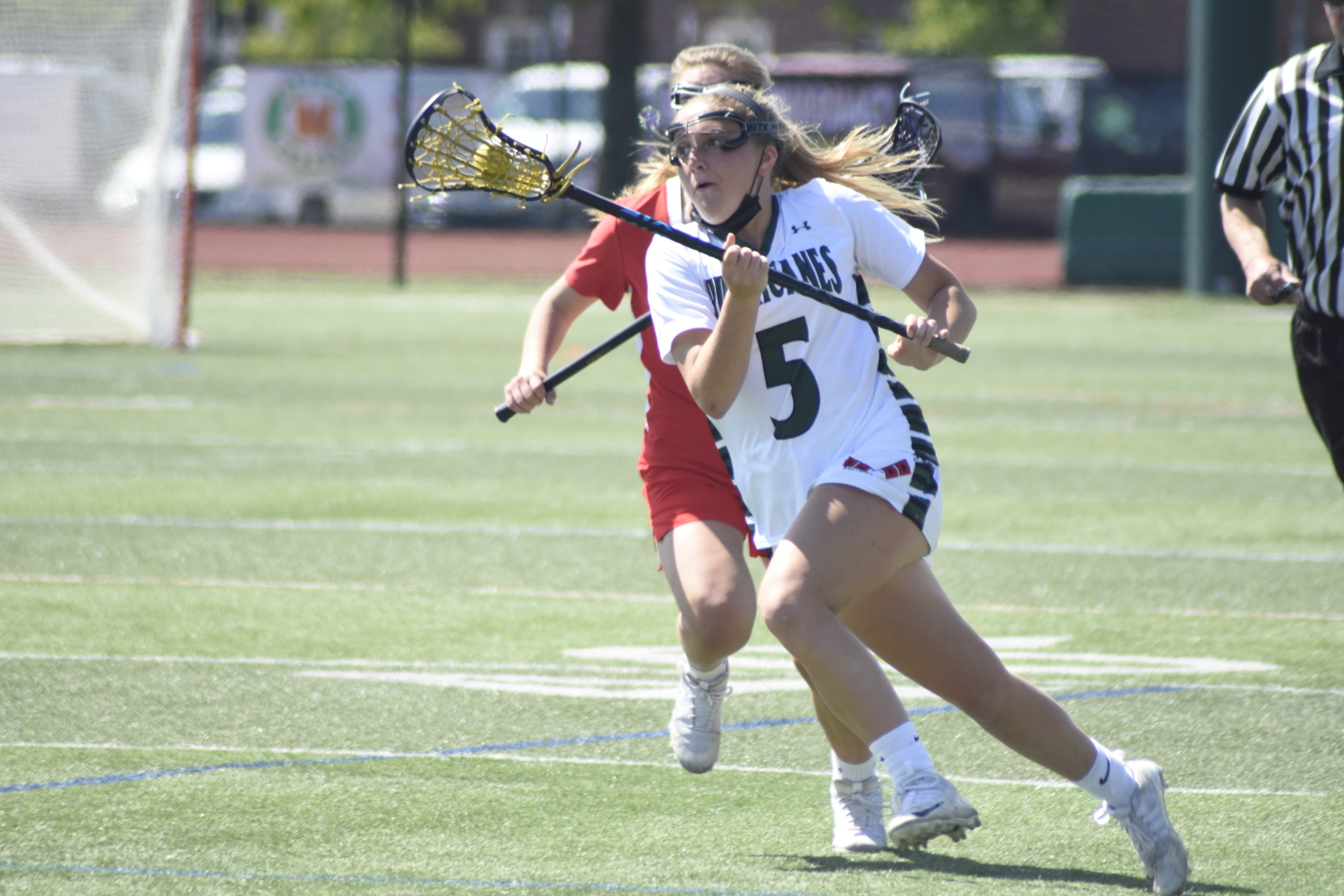 Westhampton Beach senior Caroline Henke races the ball downfield.