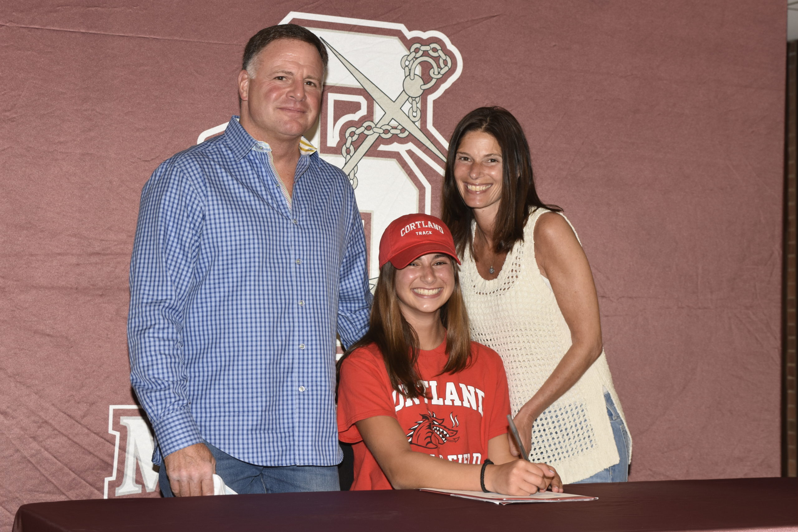 Amanda Mannino with her parents Michael and Stephanie.