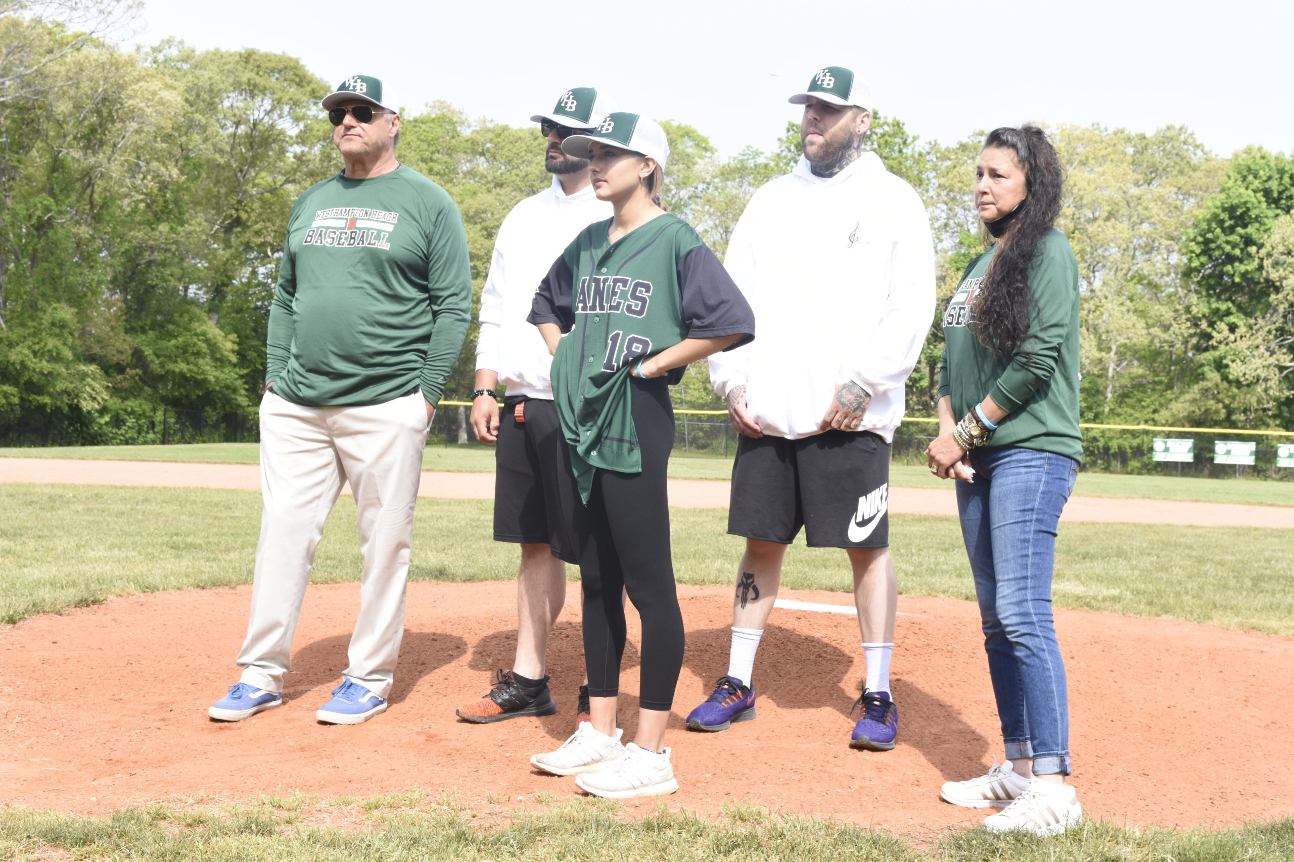 The Mongelluzzo Family -- Michael, Zelda, Michael Jr., Ava, Frank and Zelda -- get set to throw out the first pitch of their late son and brother Gianni on Saturday morning.