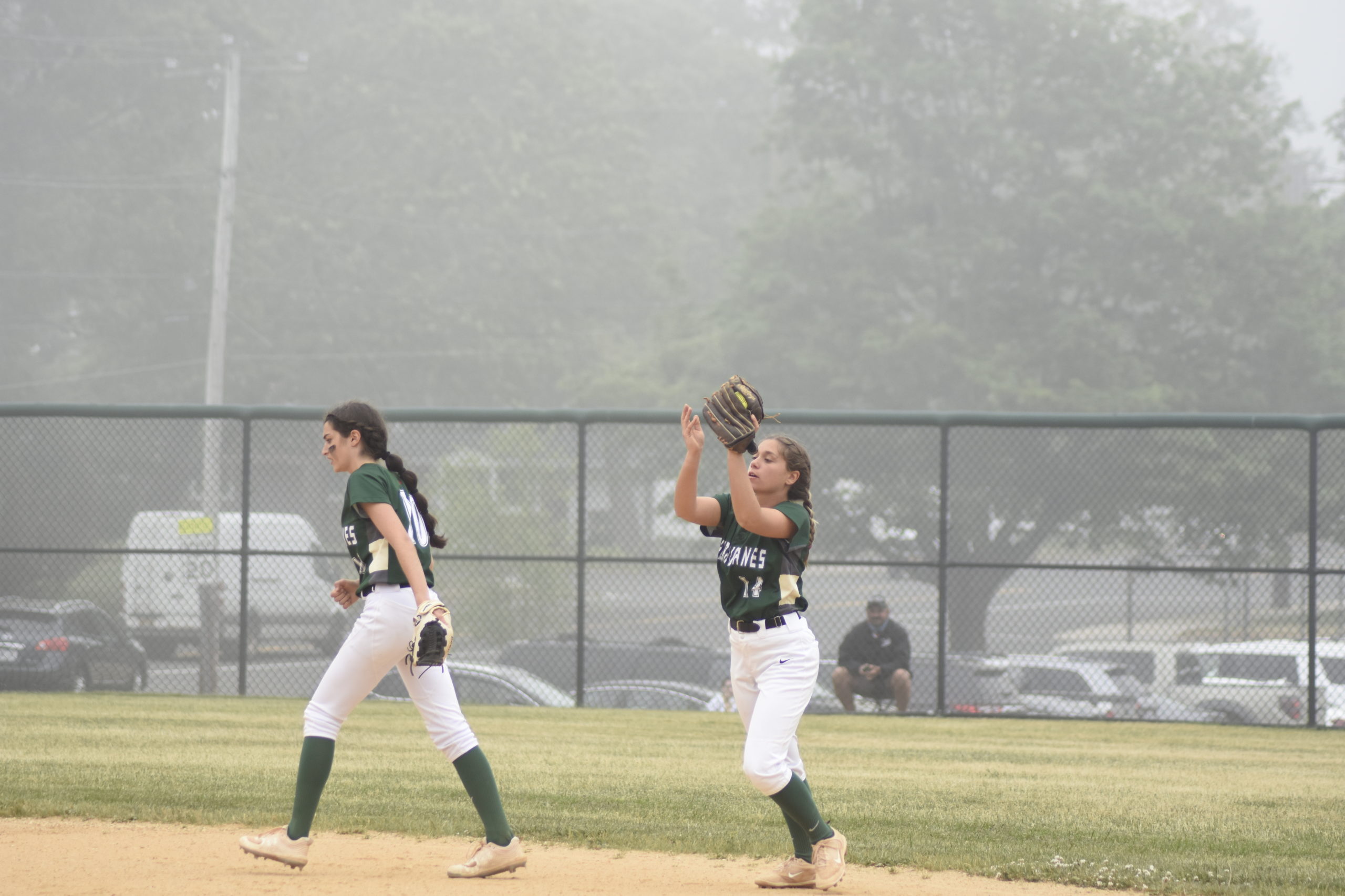 Westhampton Beach second baseman Elana Seltzer squeezes a pop fly in her mitt for an out.