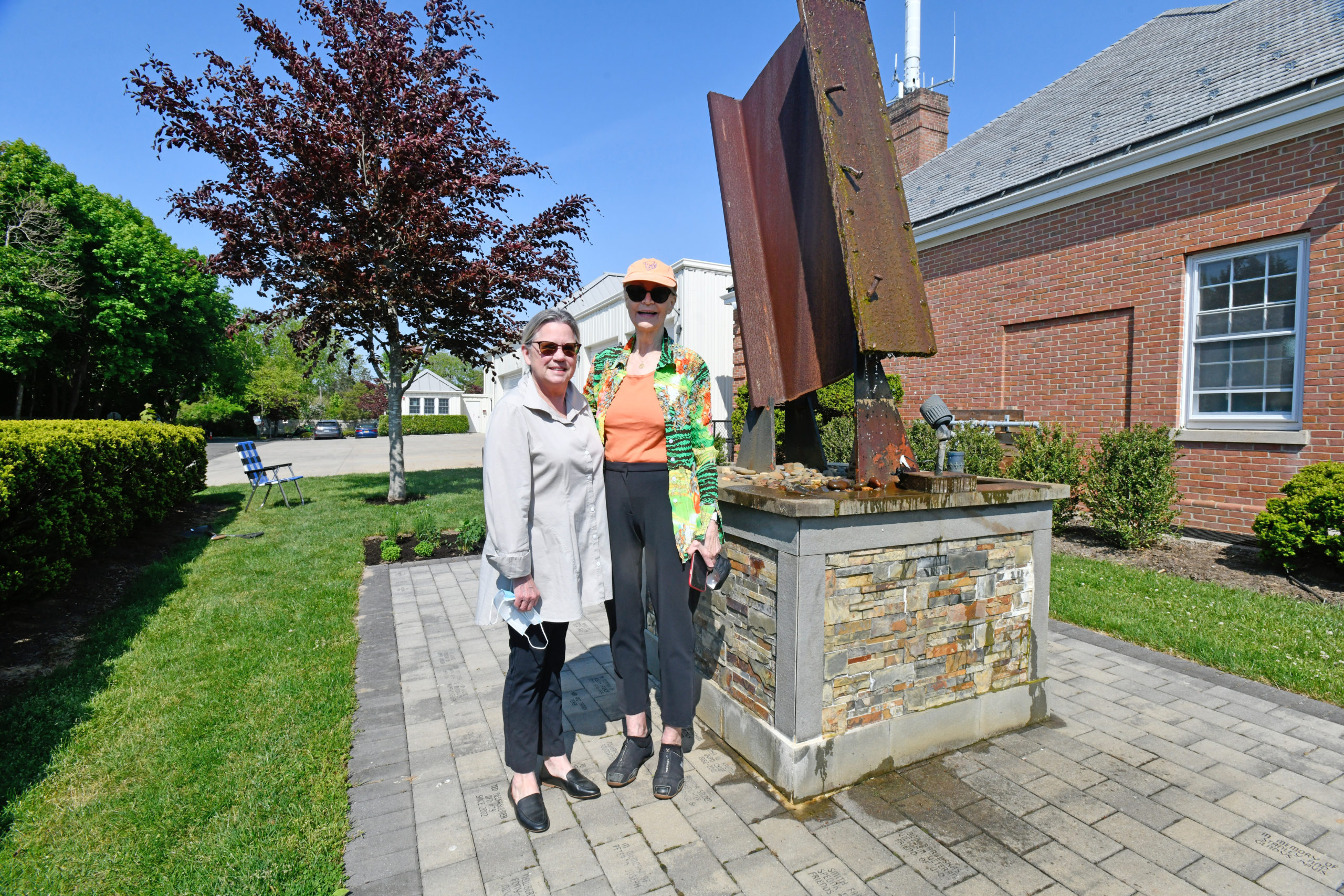 Susanne Jannson and Inger Mejean at the memorial in Quogue.    DANA SHAW