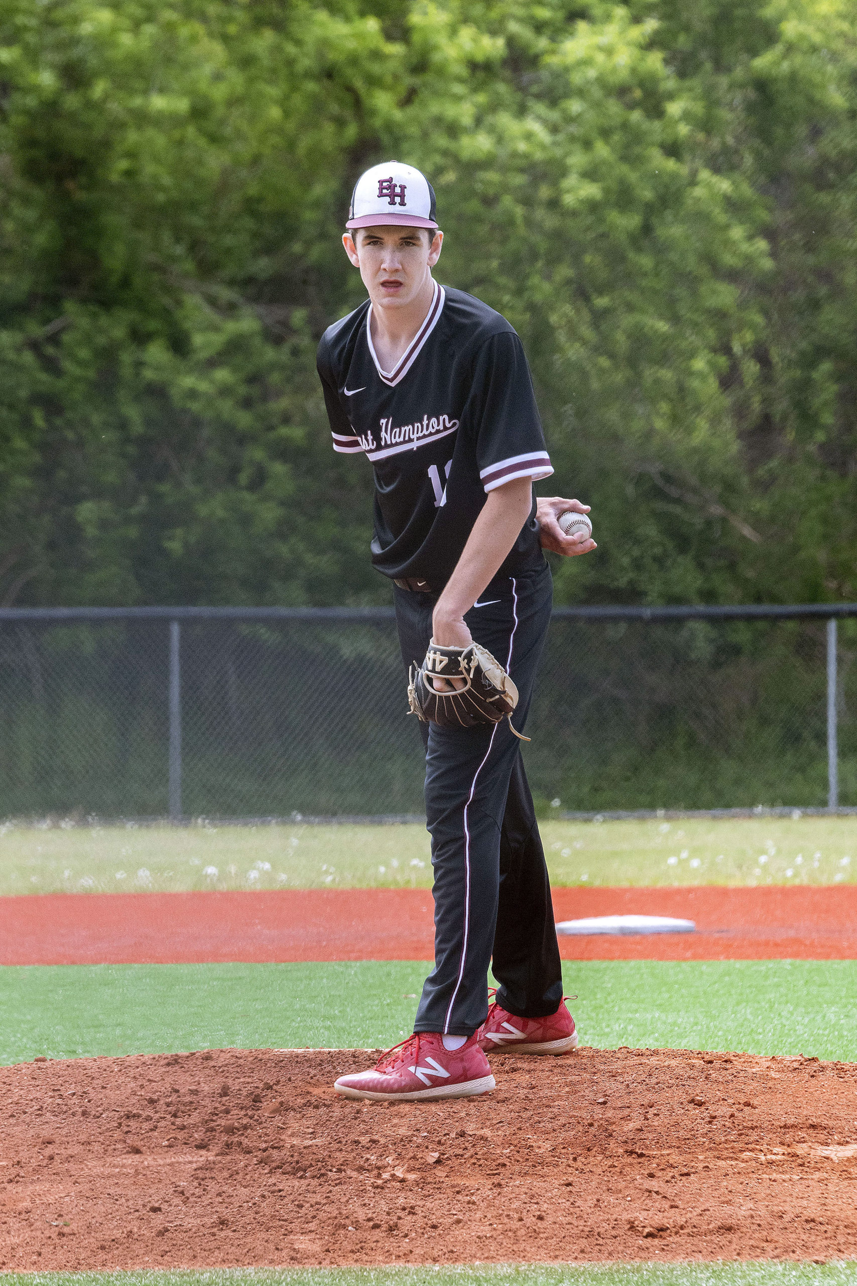 East Hampton junior Colin Ruddy was on the mound Saturday morning against Hills West.