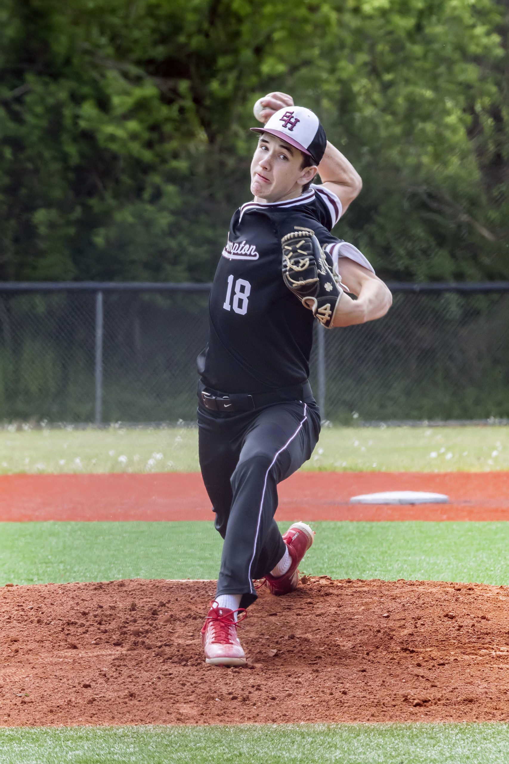 East Hampton junior Colin Ruddy was on the mound Saturday morning against Hills West.