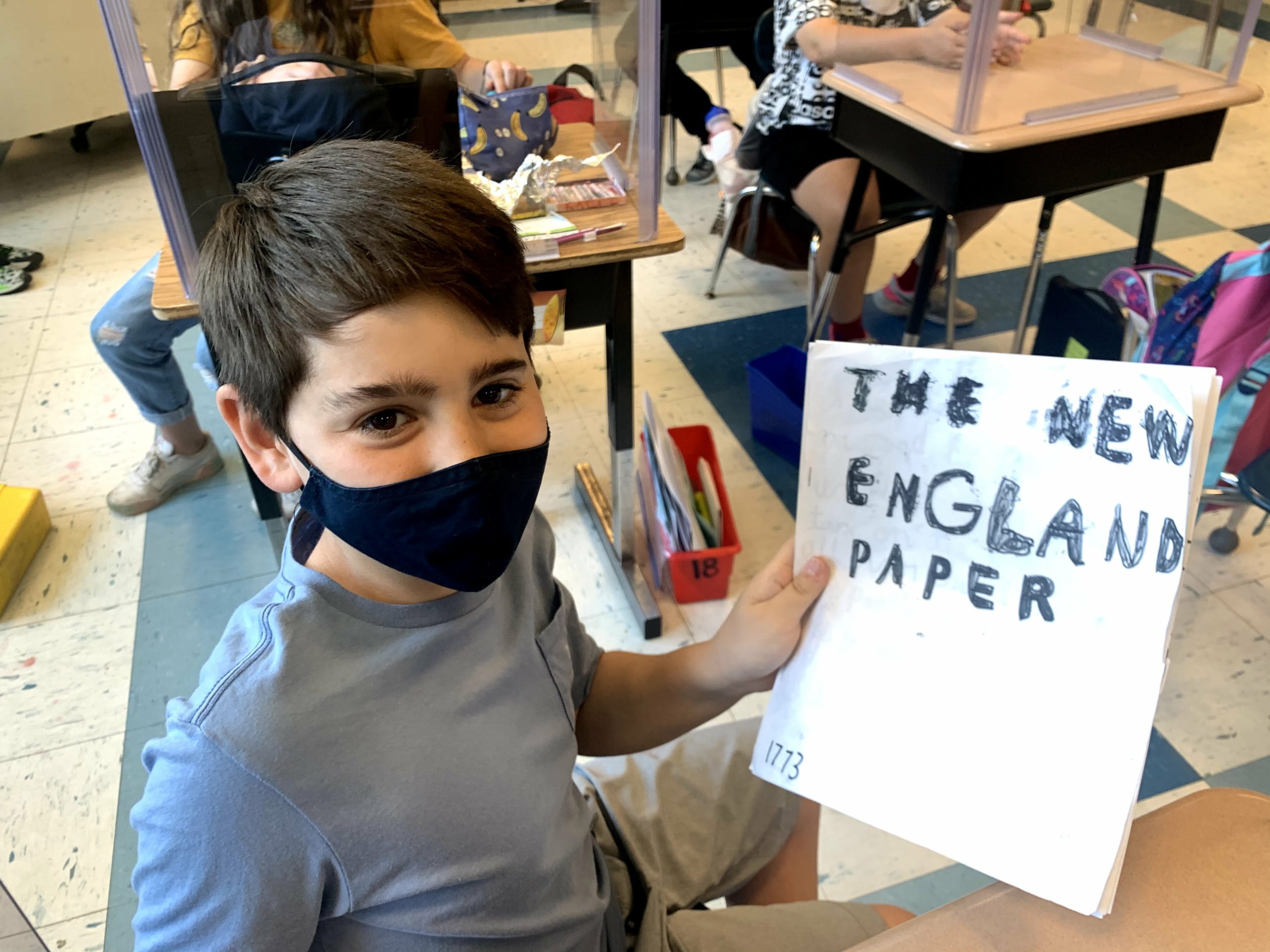 Jack Stalters, in Mrs. O'Brien's class at East Quogue Elementary School, was assigned the colonial job of a printer last week, and he used clay and colored the clay with marker to make this headline of a newspaper from colonial times.