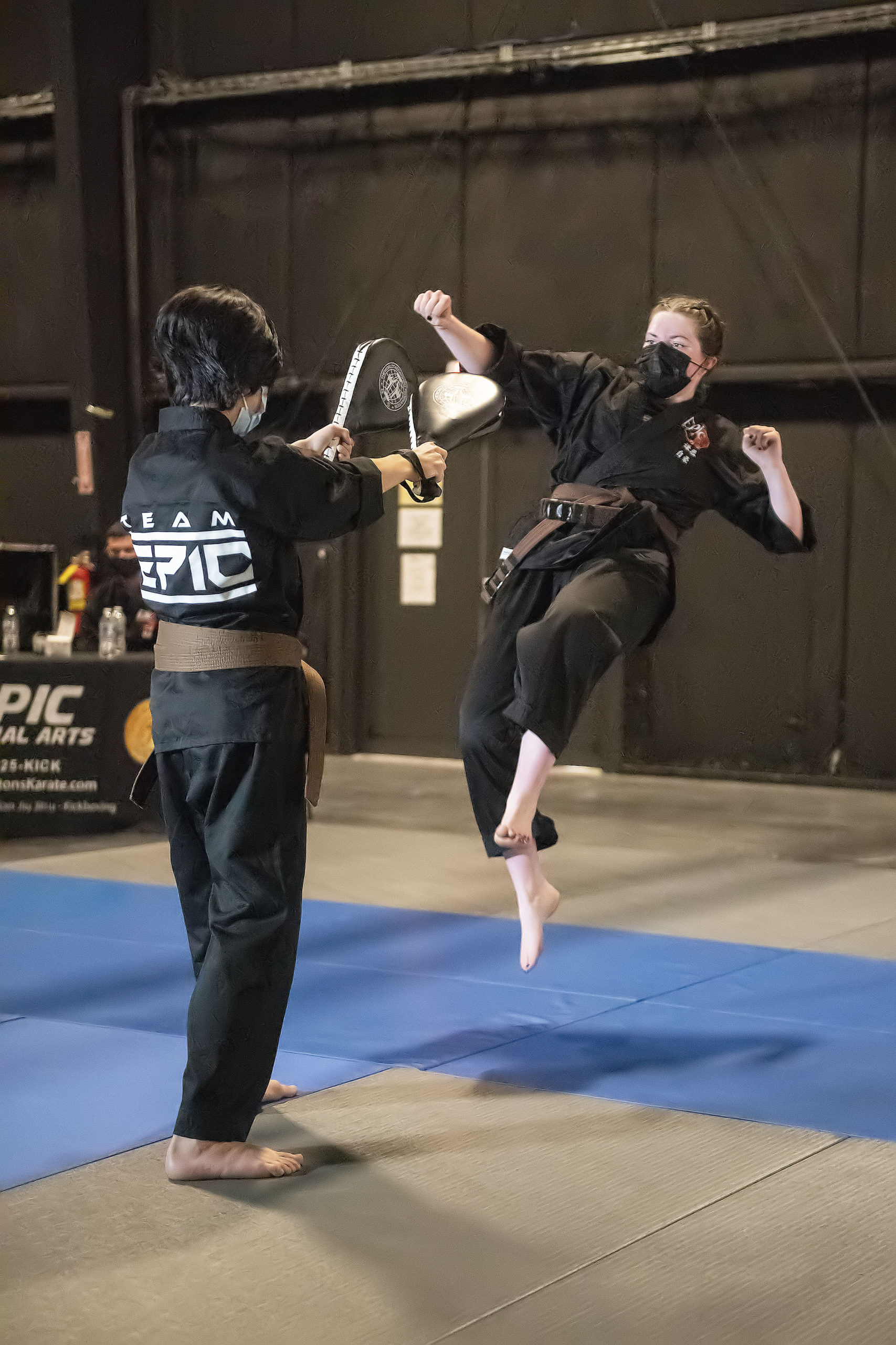 EPIC Martial Arts brown belt student Emily Glass performs a series of skills before a panel of six black belts in order to receive her own promotion to black belt during a ceremony at LTV studios in Wainscott on Sunday.