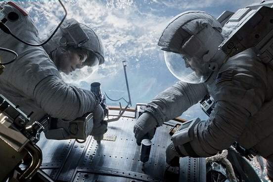 Sandra Bullock and George Clooney in Alfonso Cuarón 2013 film “Gravity.