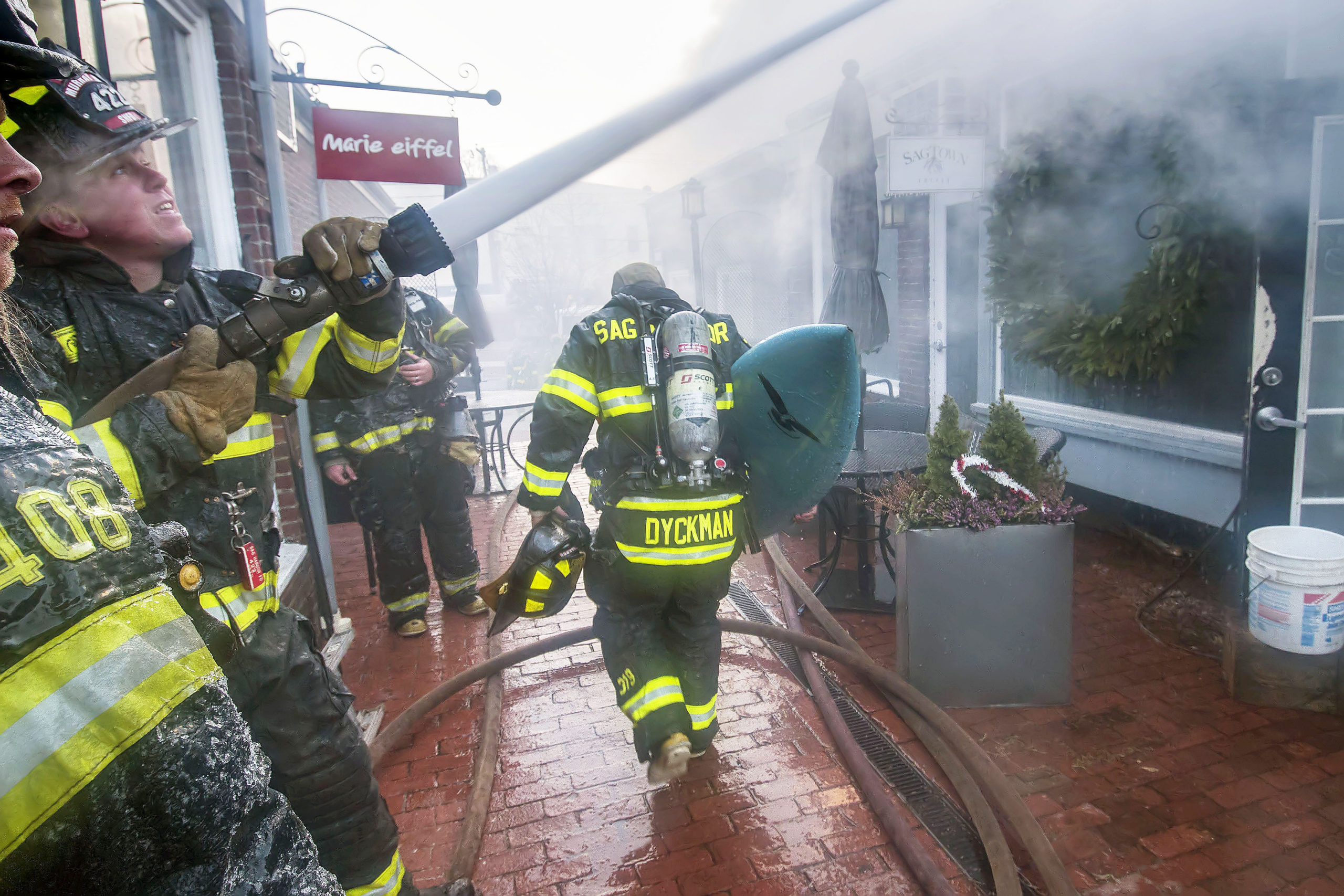 On the day of the fire Shane Dyckman, owner of SagTown Coffee and a Sag Harbor firefighter, saved a surfboard made by legendary surfer Rikcky Rasmussen that had been on display in his store.