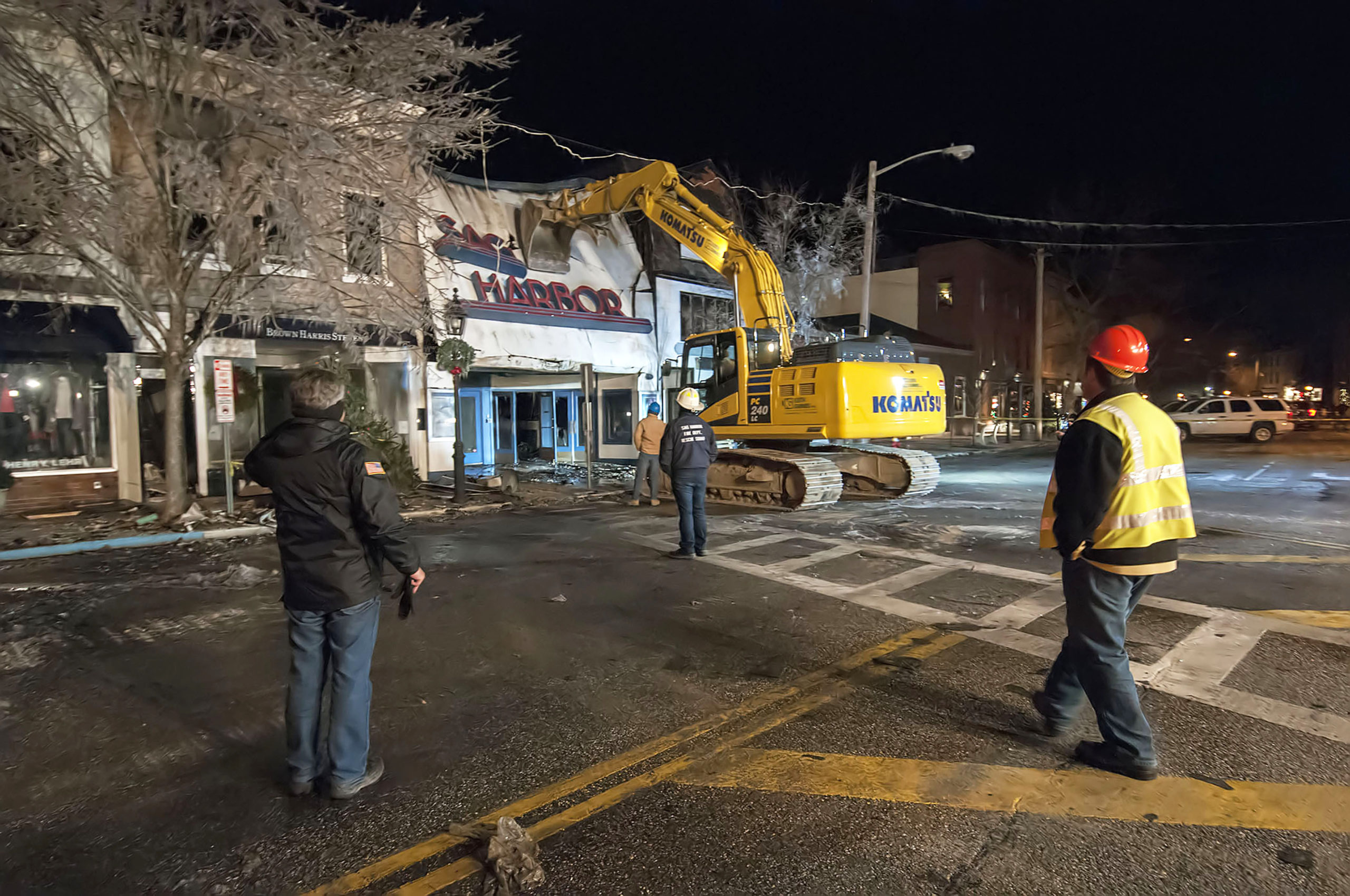 The Sag Harbor Cinema facade is torn down after the fire, December 16, 2016.
