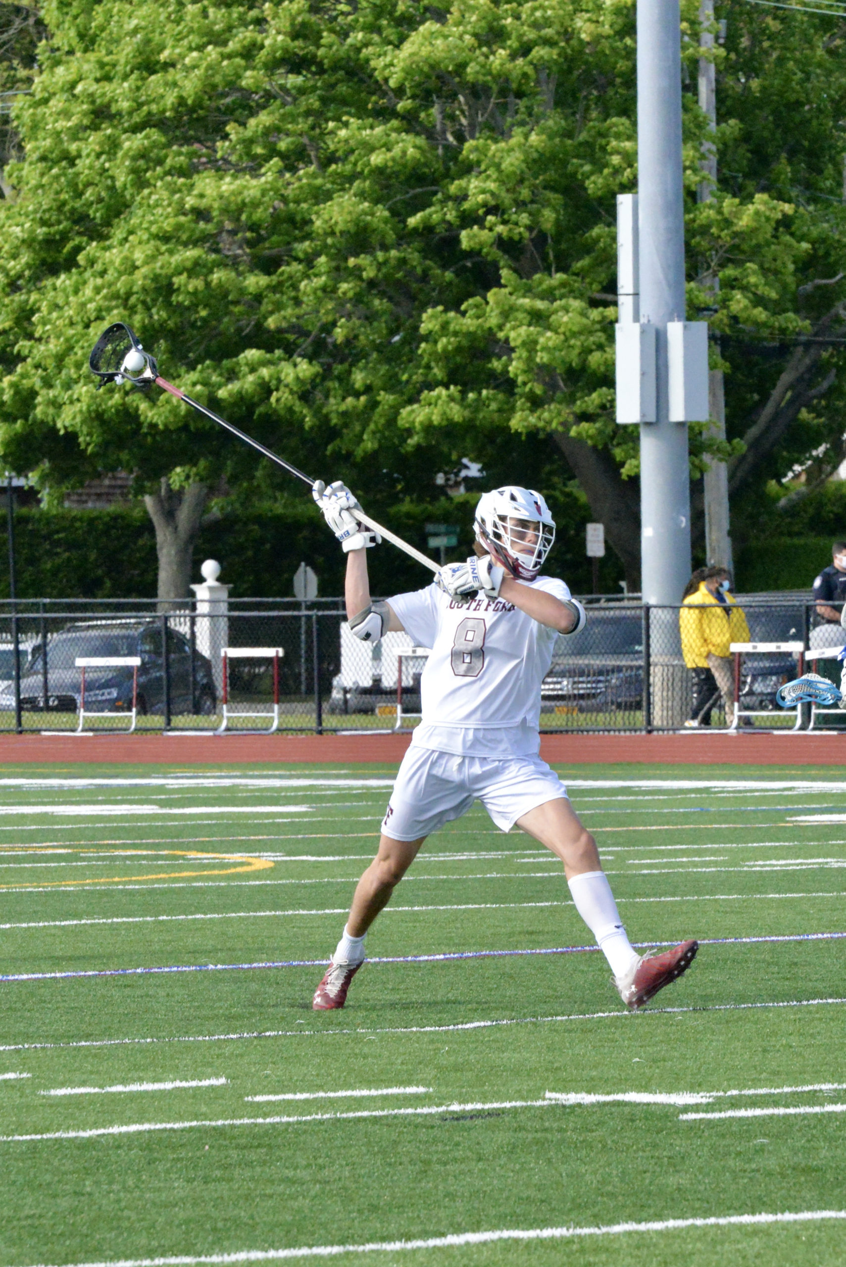 East Hampton senior Bryan Pannasch loads up to take a shot.