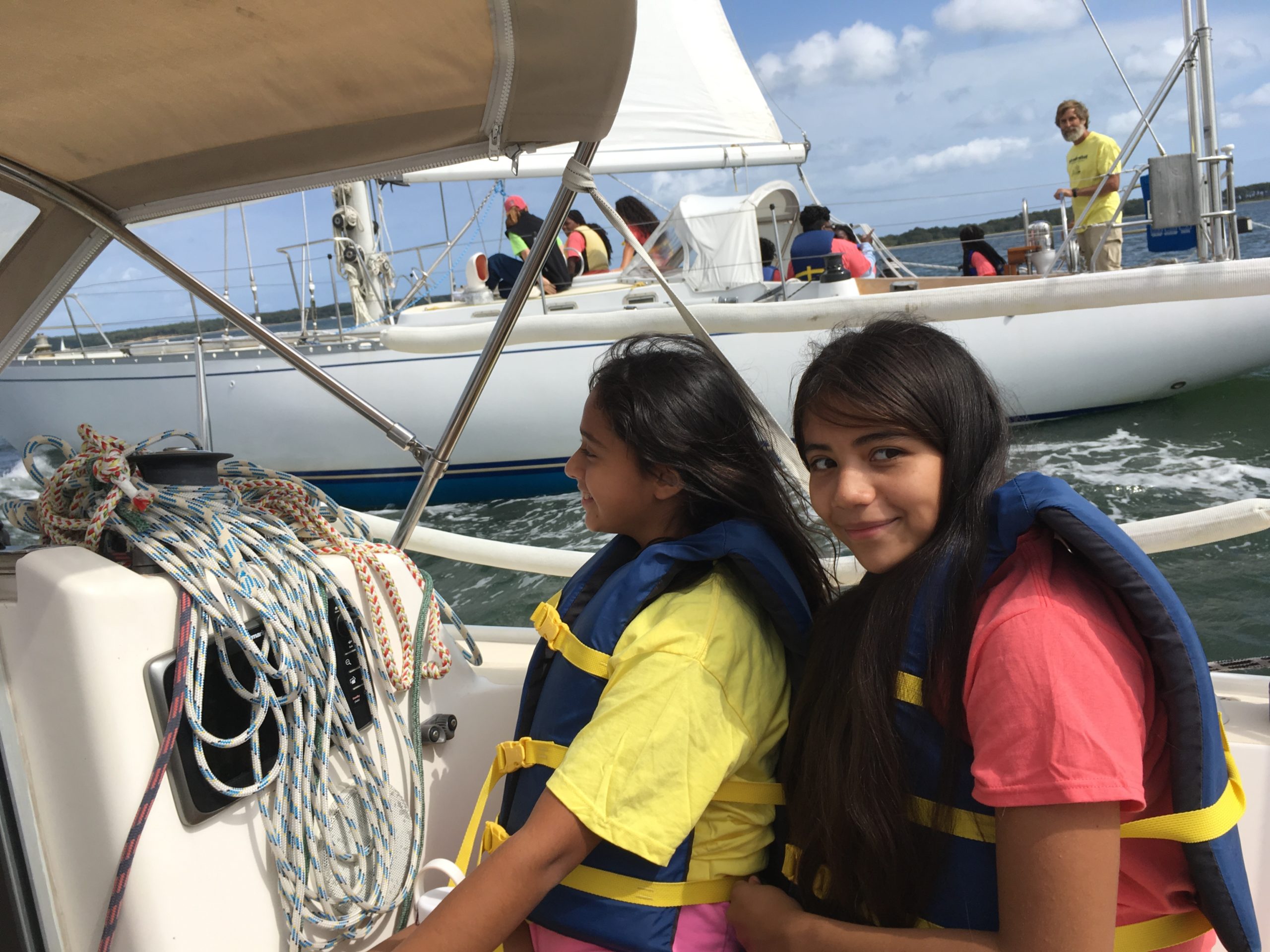 Aileen Jimenez and Erica Chaves during the 2019 AdventureSail. In the Sailboat above top BYC Laser racer Derrick Galen at the helm of his Sparkman & Stephens 45 foot yacht ALYAN.   MICHAEL MELLA