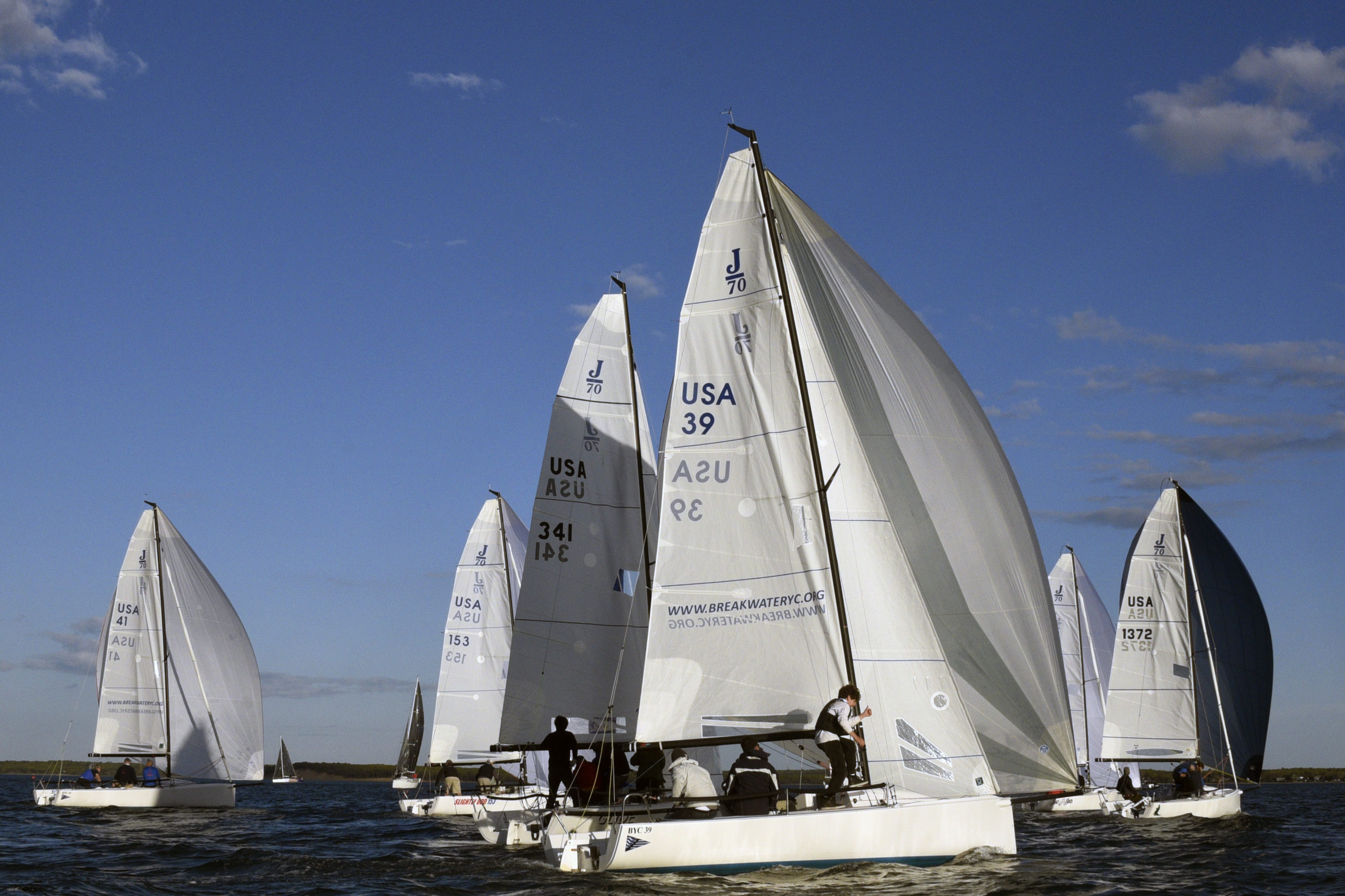 Rounding the weather mark, spinnakers hoisted seconds ago.   MICHAEL MELLA