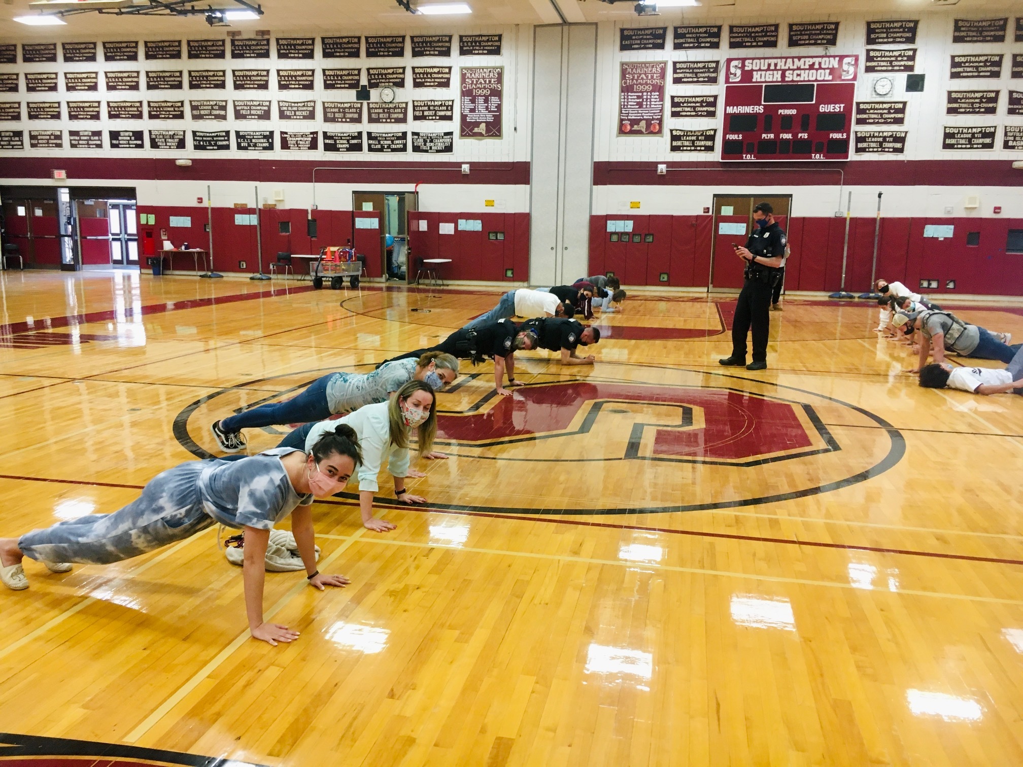 Southampton High School students and police officers compete in the Plank for Positivity Challenge.