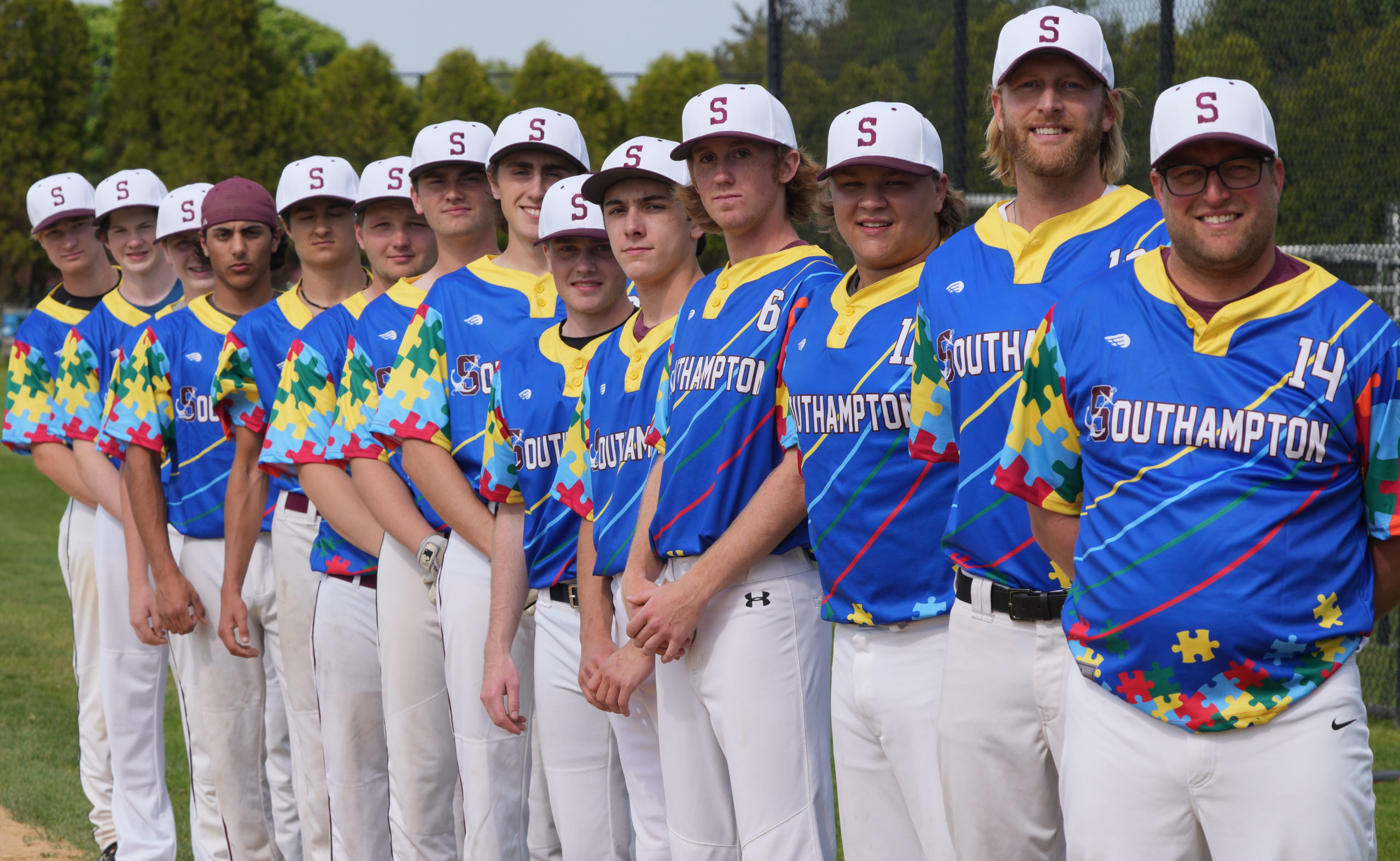 The Southampton baseball team donning the Flying Point Foundation for Autism jerseys before its game with Elwood/John Glenn on Friday.