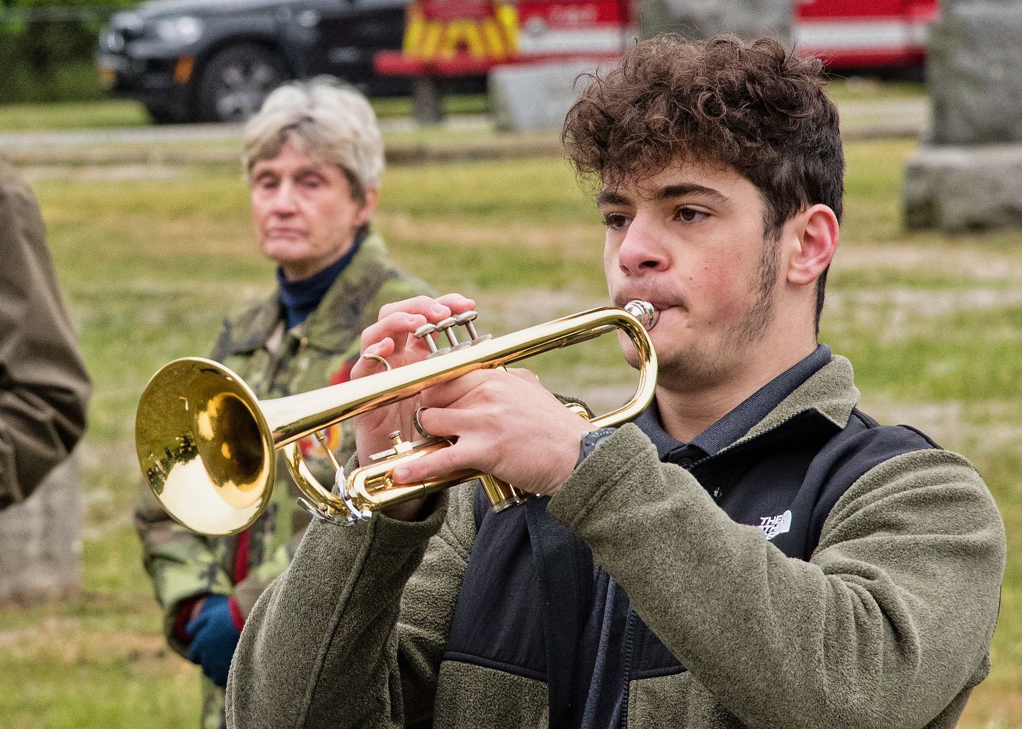Westhampton Beach High School student Joseph D’Agostino played “Taps” at the Westhampton ceremony. COURTESY WESTHAMPTON BEACH FIRE DEPARTMENT
