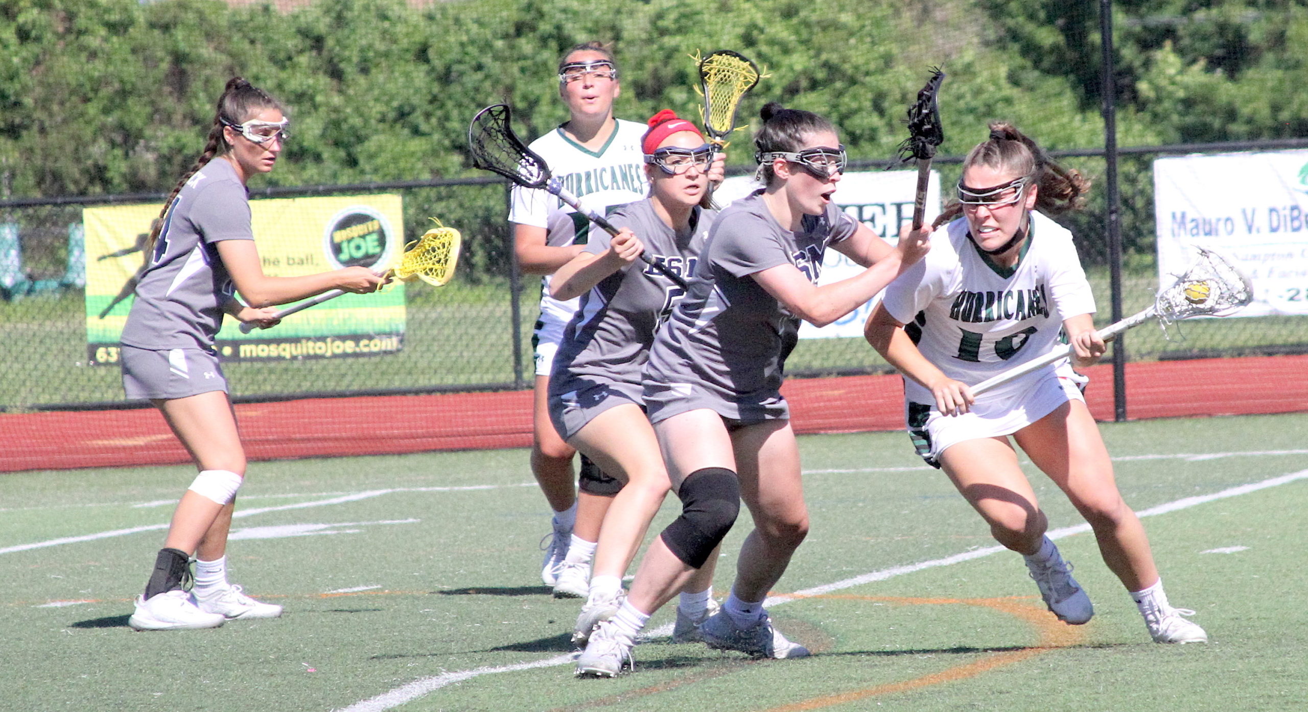 Westhampton Beach senior midfielder Maureen Duffy muscles her way toward the goal. DESIRÉE KEEGAN