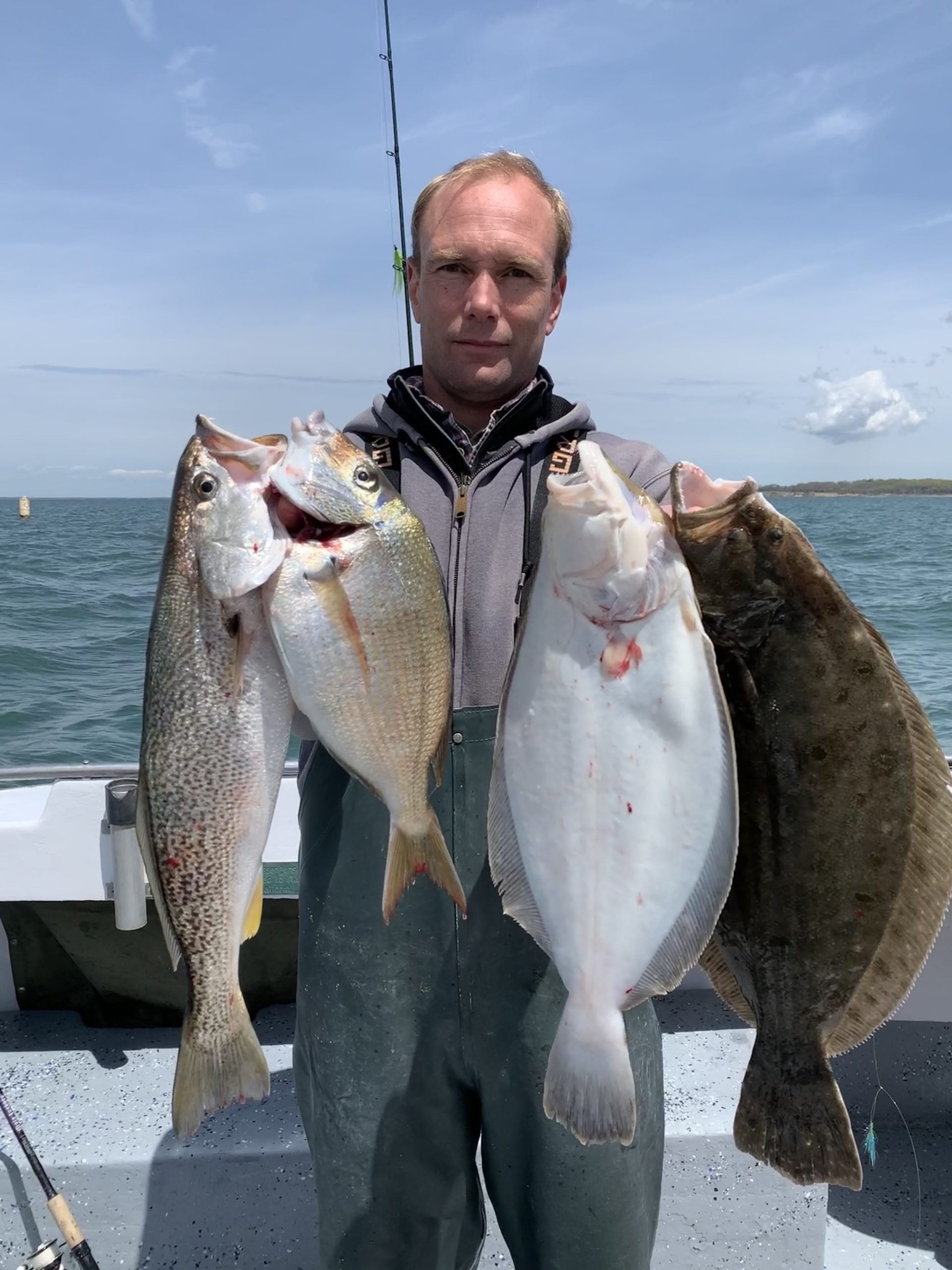 Matt Hayman with a Peconic Bay trifecta aboard the Shinnecock Star over the weekend. Weakfish, porgies and fluke, and some striped bass and bluefish, too, are being caught in growing numbers in the same stretches of the bays these days.  Deena Lippman