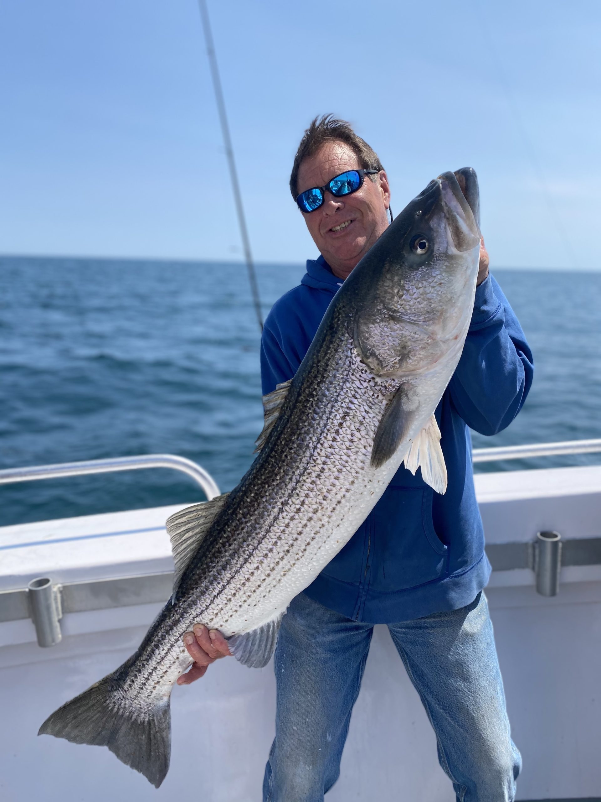 Big stripers like this one caught by Eugene O'Connor aboard the Hampton Lady last week, have arrived in South Fork waters and there are some new rules about how you may catch them this year.
