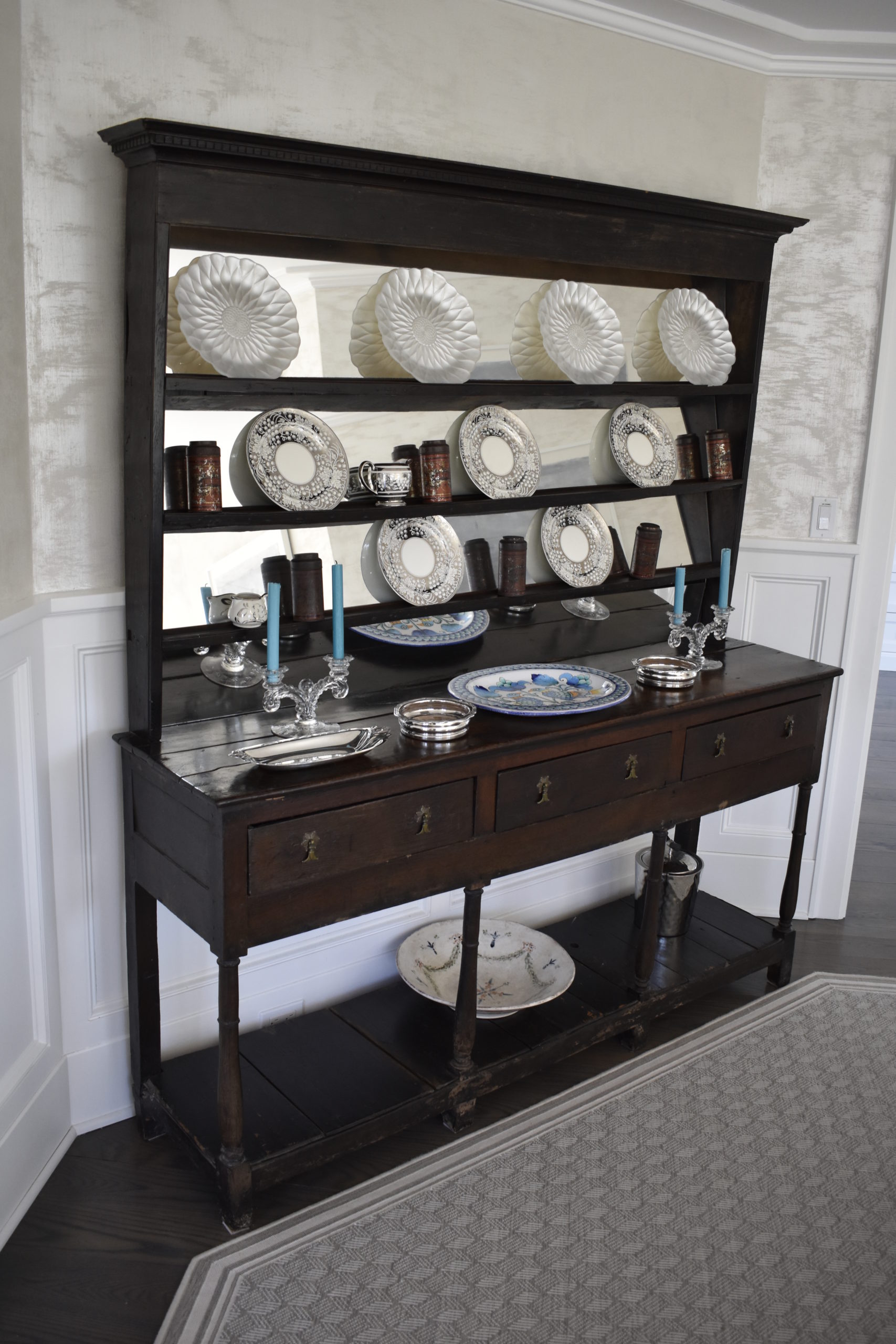 Evan Mason added mirrors to a piece of heirloom furniture to brighten it up. BRENDAN J. O'REILLY