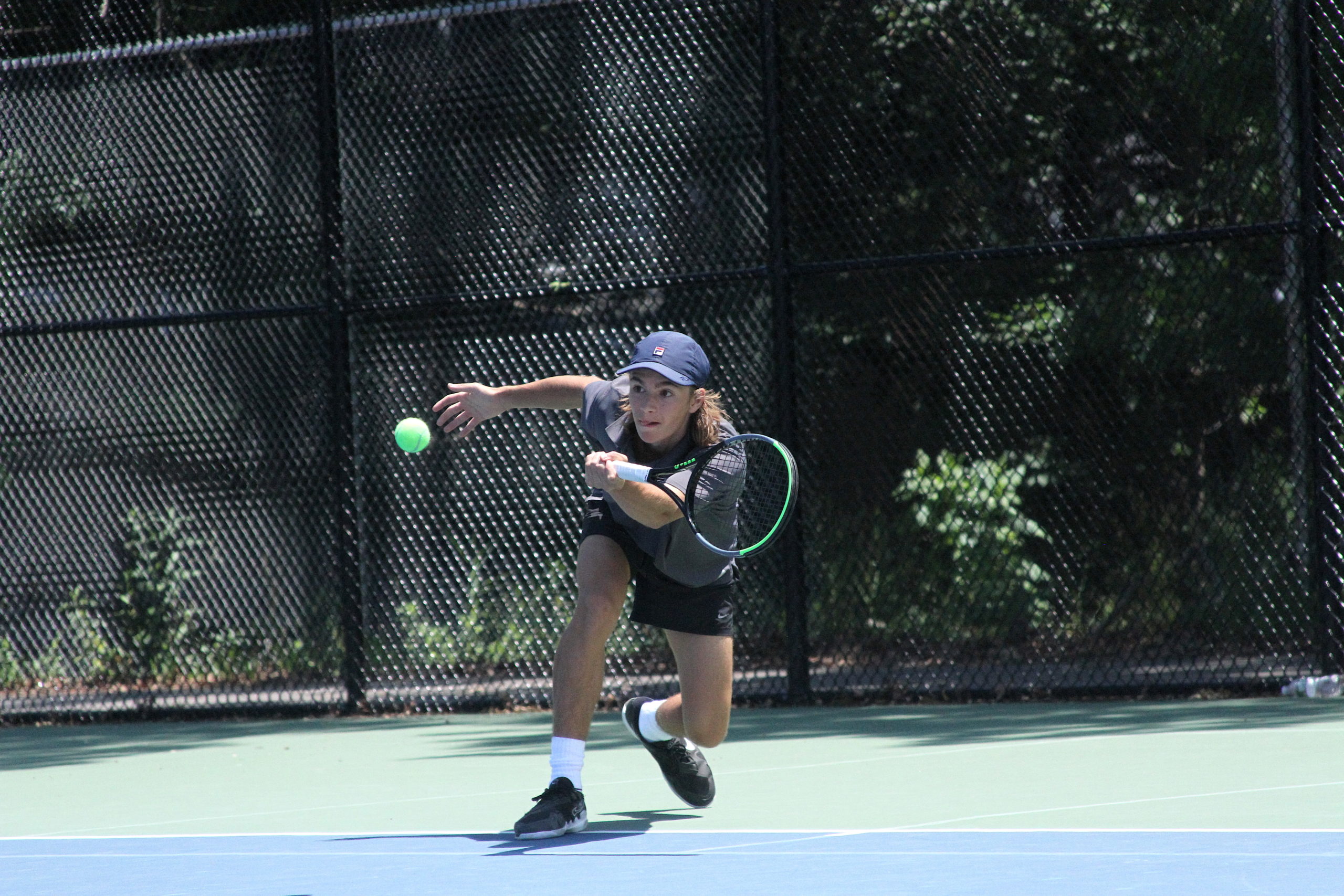 East Hampton sophomore Max Astilean returns a serve in the quarterfinals of the Suffolk County individual tennis tournament June 11. DESIRÉE KEEGAN