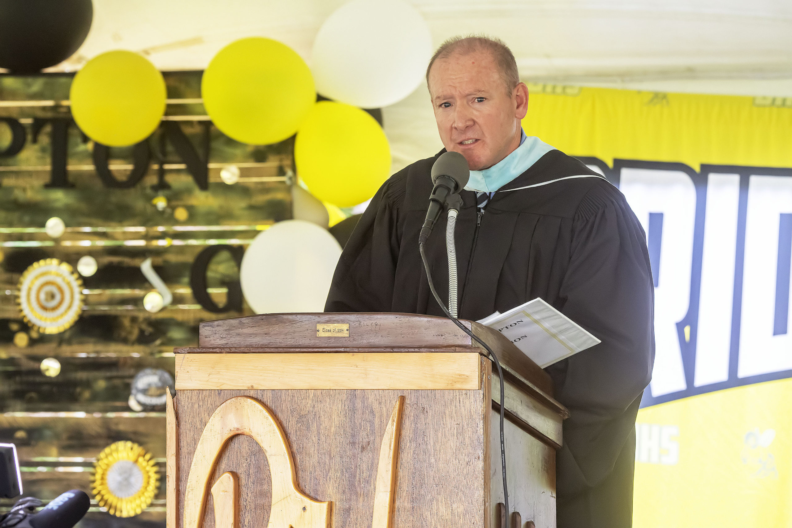 Bridgehampton Schools Superintendent Robert Hauser addresses the crowd during the school's 2021 commencement ceremony on Saturday.  MICHAEL HELLER