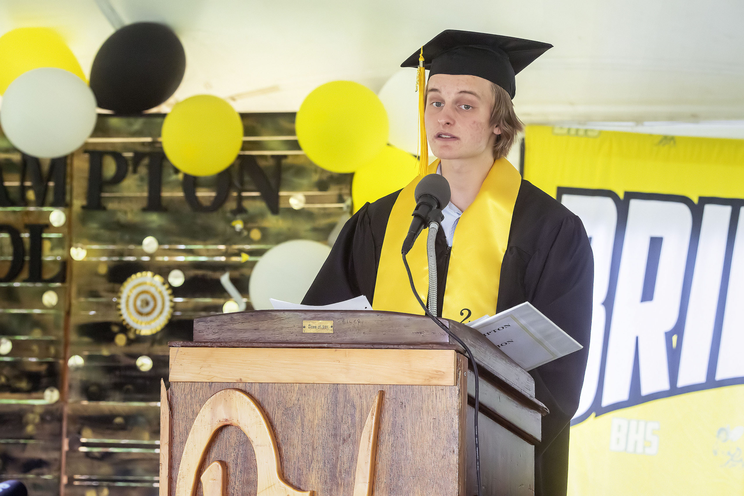 Bridgehampton School 2021 Senior Class Salutatorian Miles Clark addresses the crowd during the school's 2021 commencement ceremony on Saturday.      MICHAEL HELLER