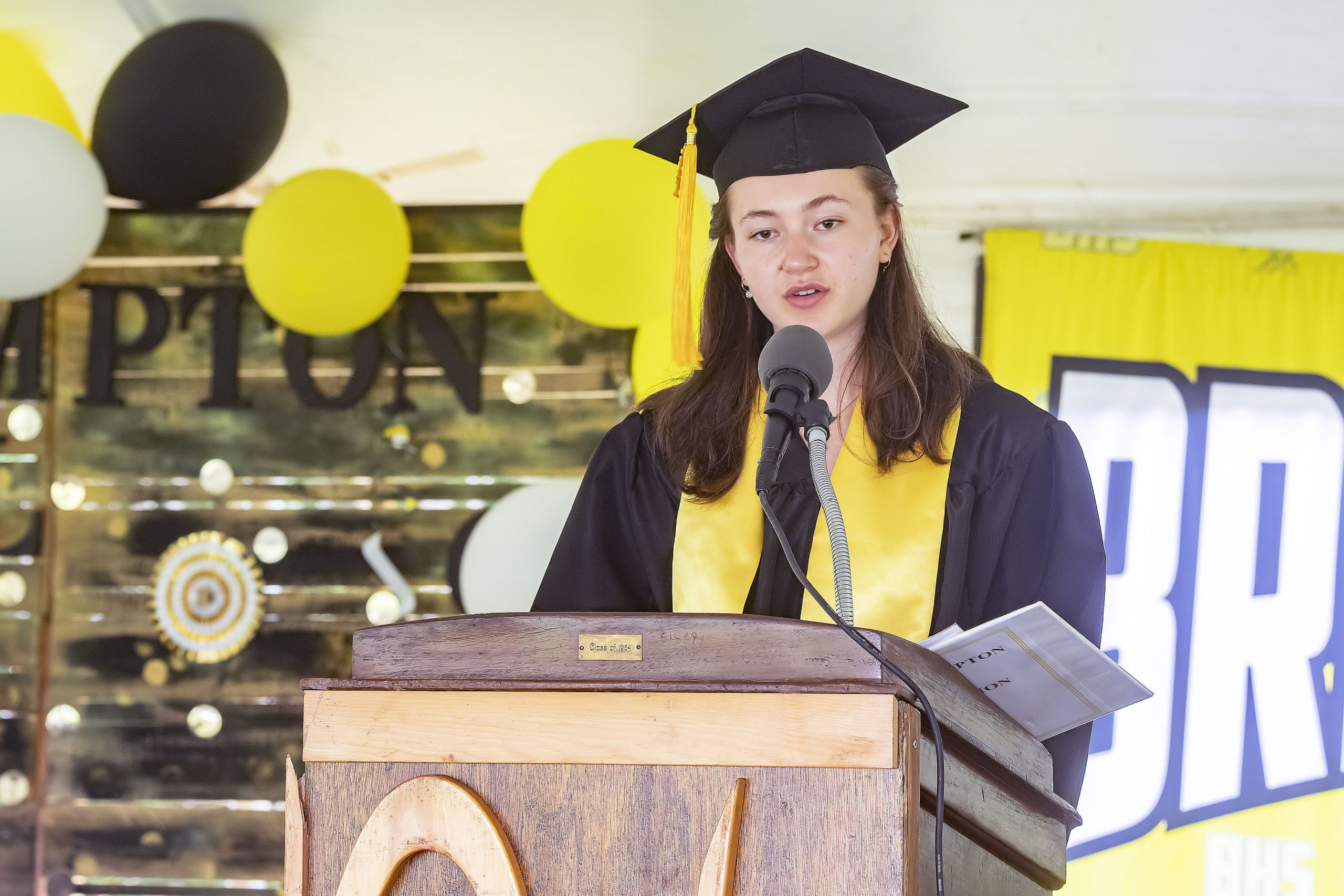 Bridgehampton School 2021 Senior Class Valedictorian Zoe Lucas addresses the crowd during the school's 2021 commencement ceremony on Saturday.   MICHAEL HELLER