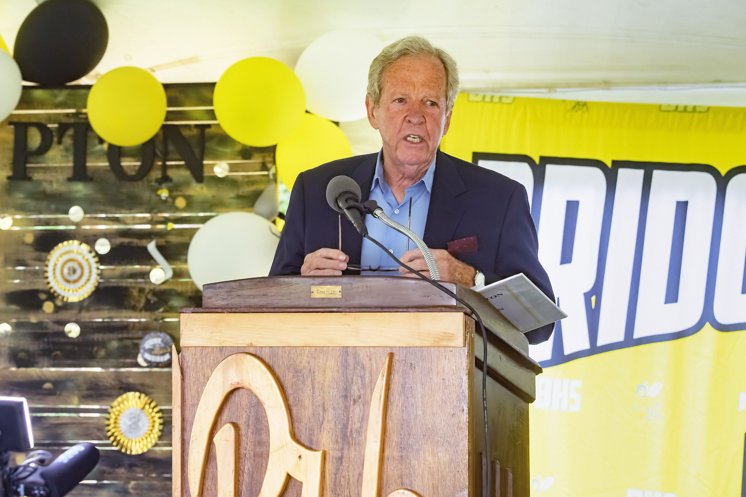 Keynote Speaker Michael Donovan addresses the crowd during the school's 2021 commencement ceremony on Saturday.    MICHAEL HELLER