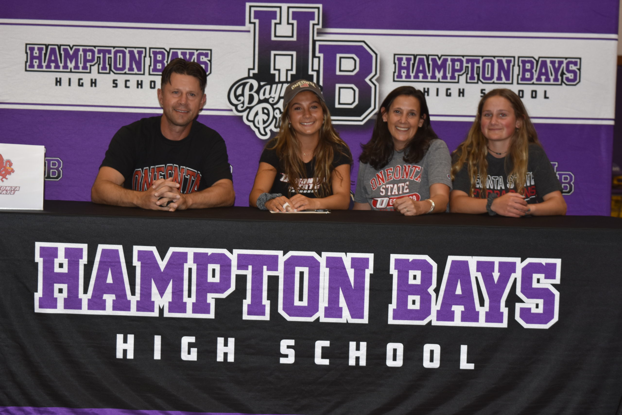 From left, Vinny, Cassidy, Dawn and Jamie Moore. Cassidy Moore signed her letter of intent to play lacrosse at SUNY Oneonta on June 1.