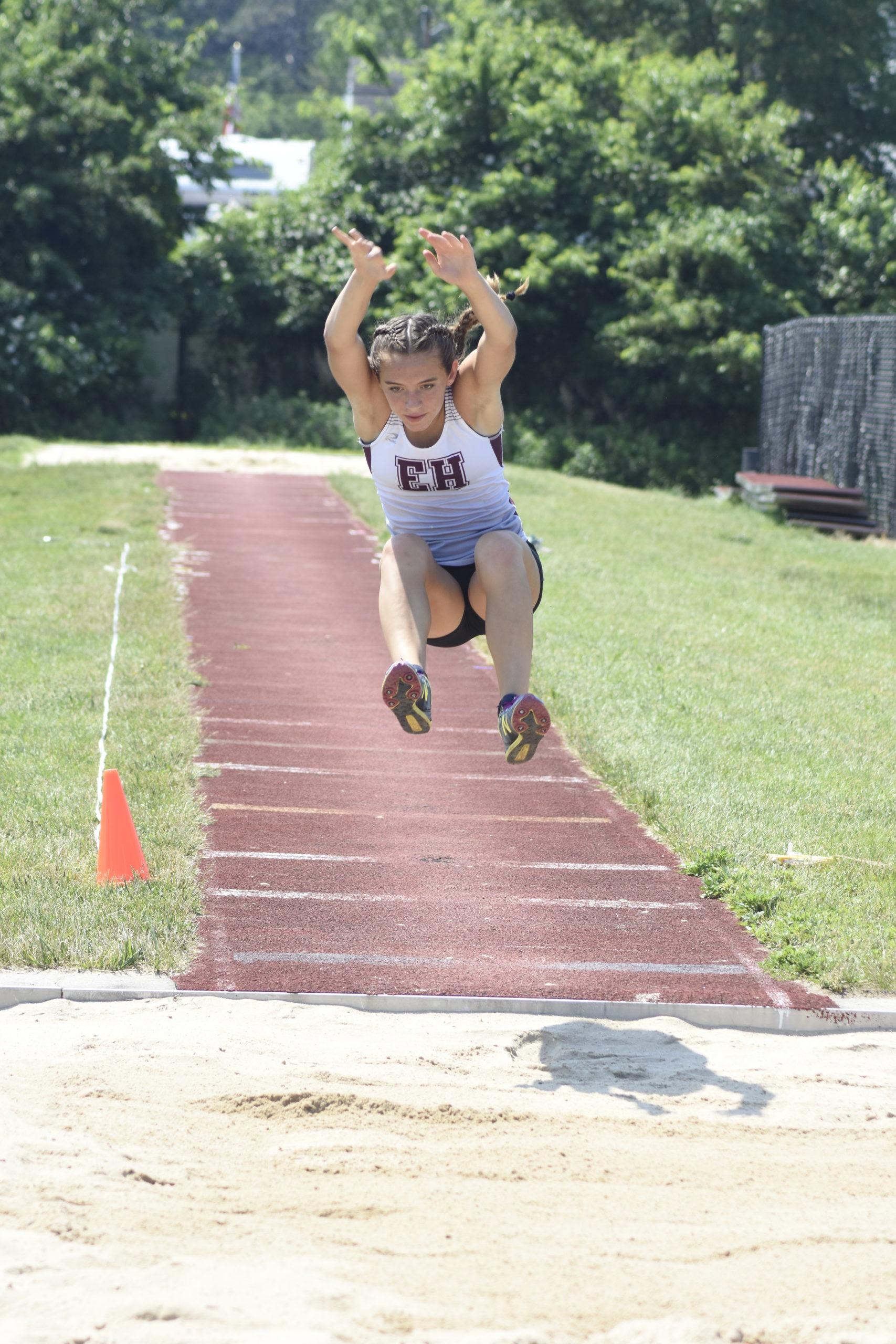 Senior Bonacker Bella Tarbet in the long jump of the pentathlon.