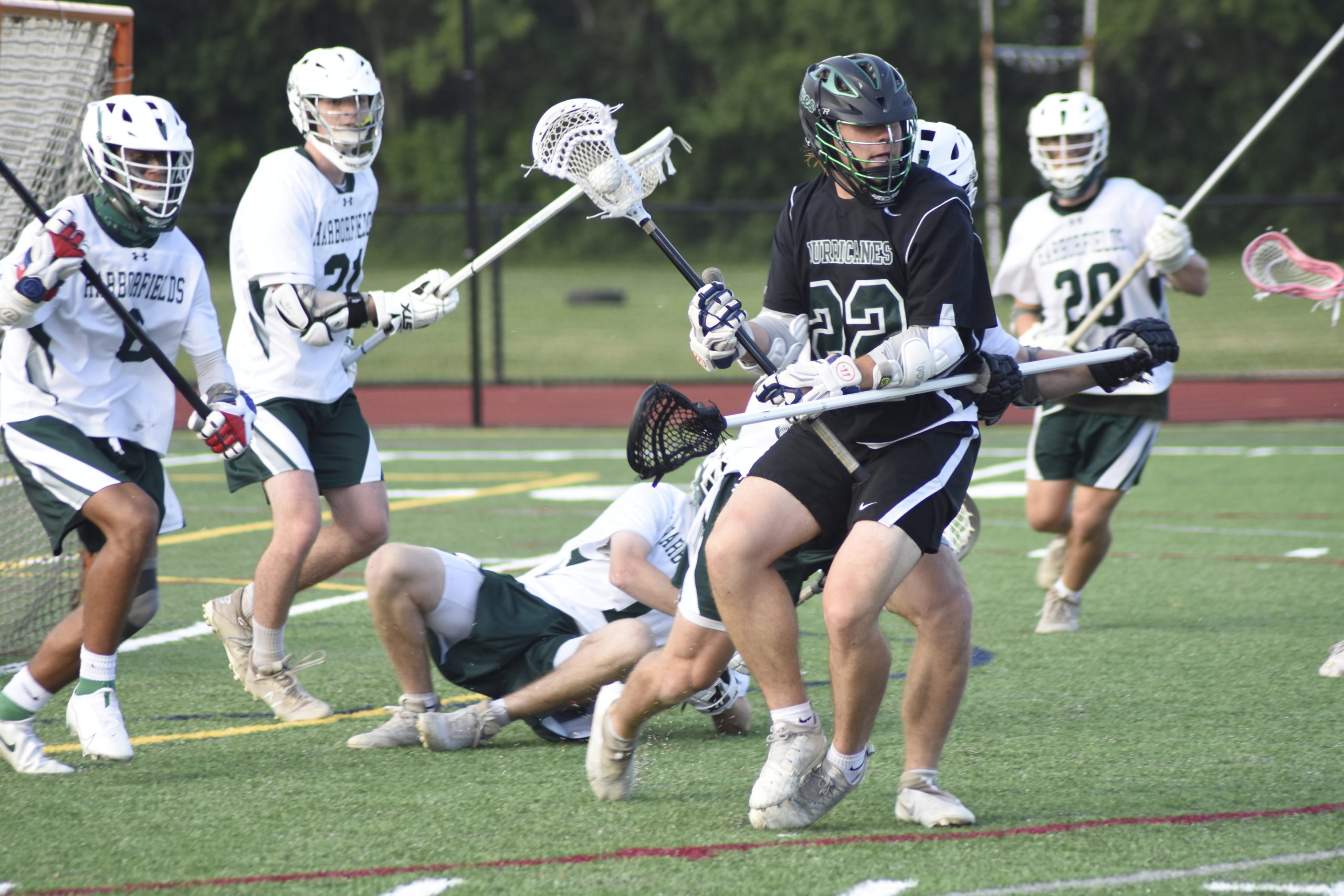 Jack Moloney of Westhampton Beach works against the Harborfields defense.
