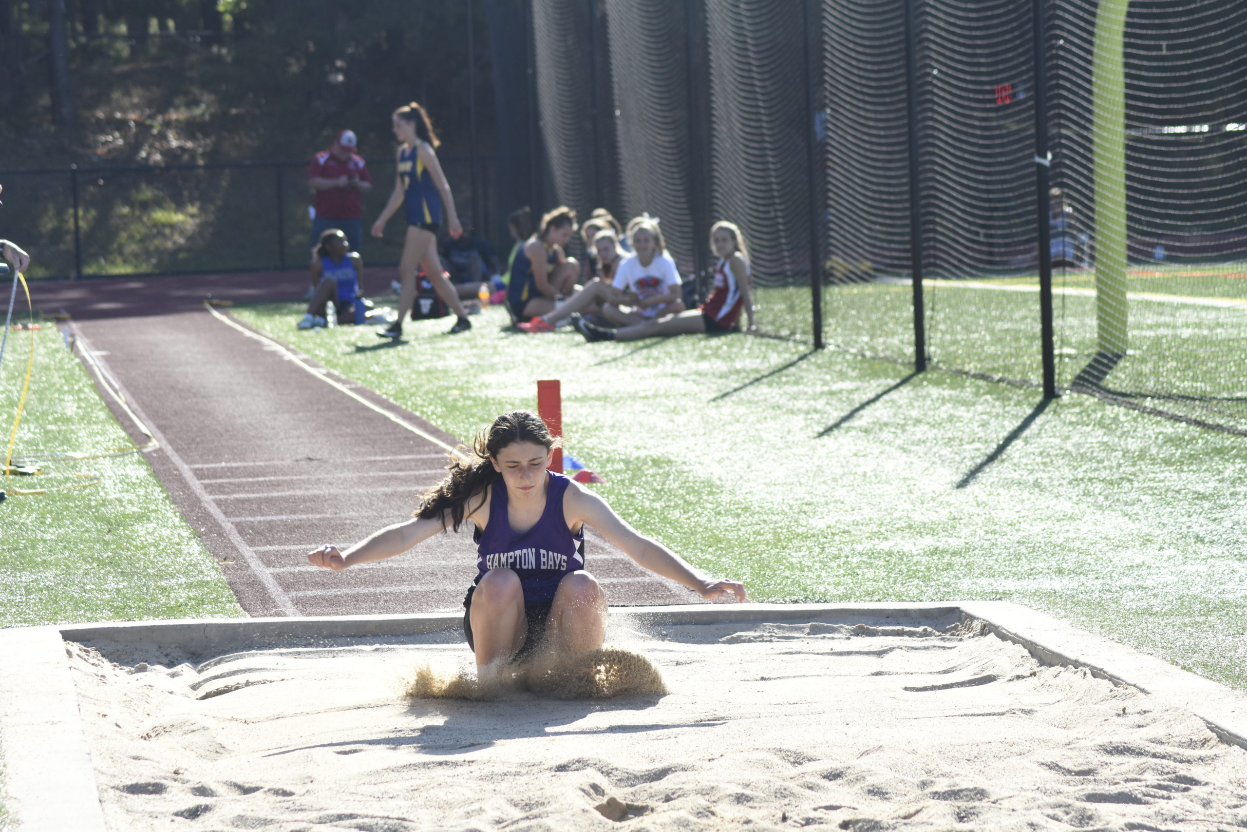 Hampton Bays freshman Emma Halsey makes her mark in the triple jump.