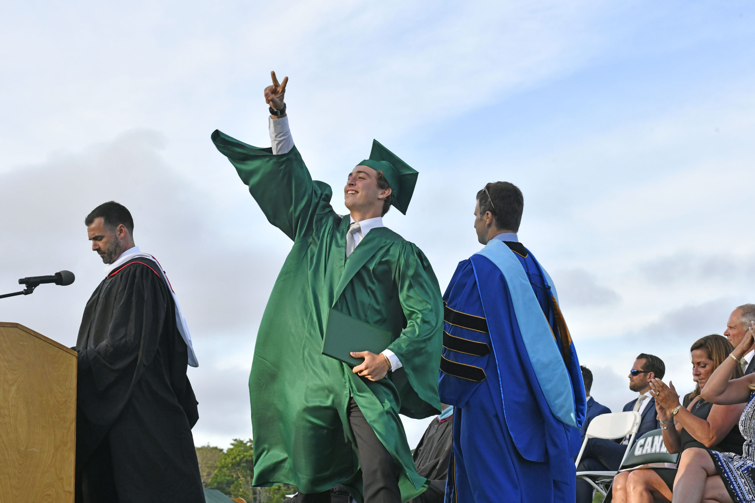 Santo Benenati receives his diploma.  DANA SHAW