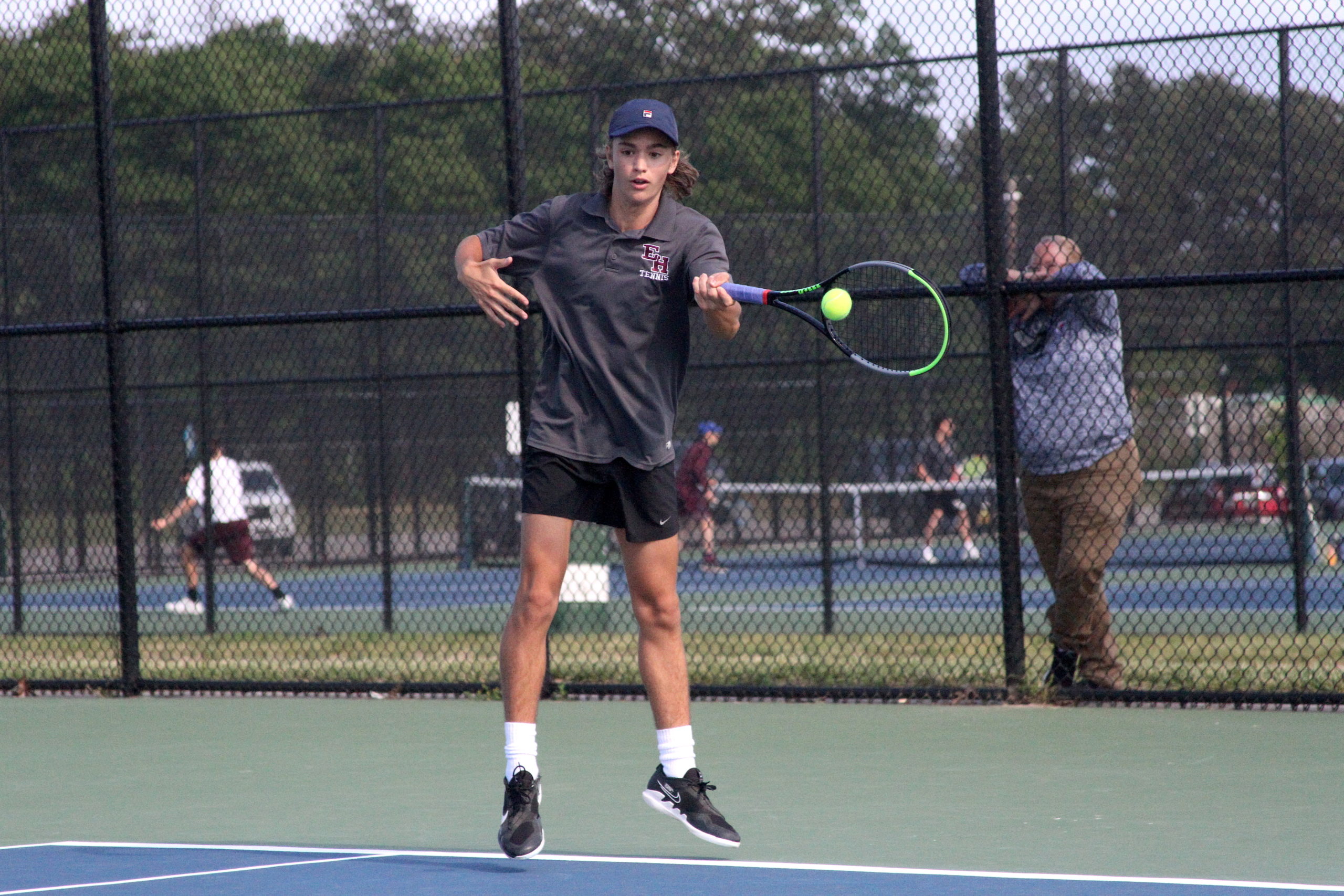 East Hampton sophomore Max Astilean keeps the volley going in his Division IV finals match. DESIRÉE KEEGAN