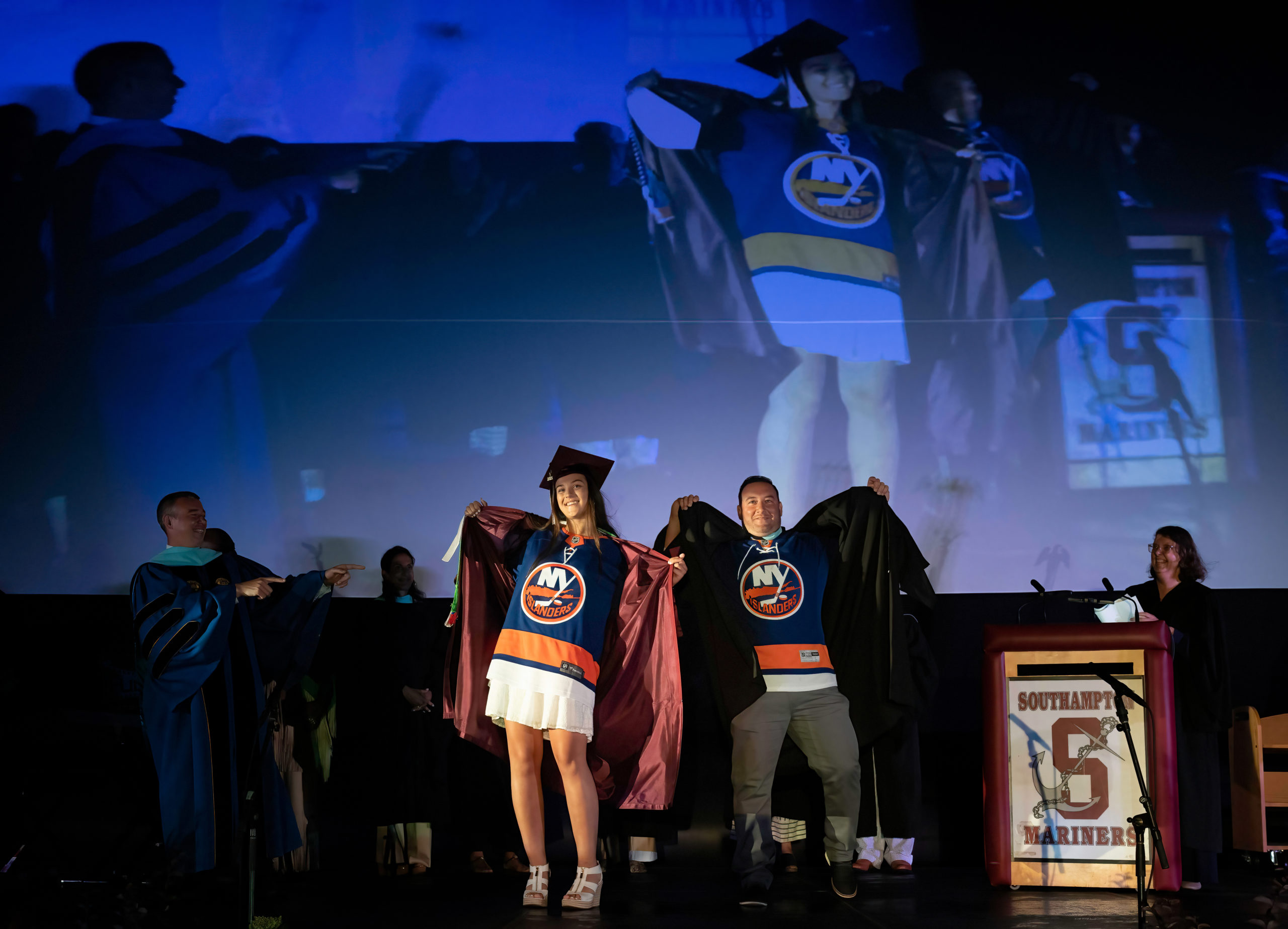 Southampton Class of 2021 graduate Reilly Zorko and Senior Class Advisor Frank Amitrano cheer on the Islanders on Friday at commencement.   RON ESPOSITO