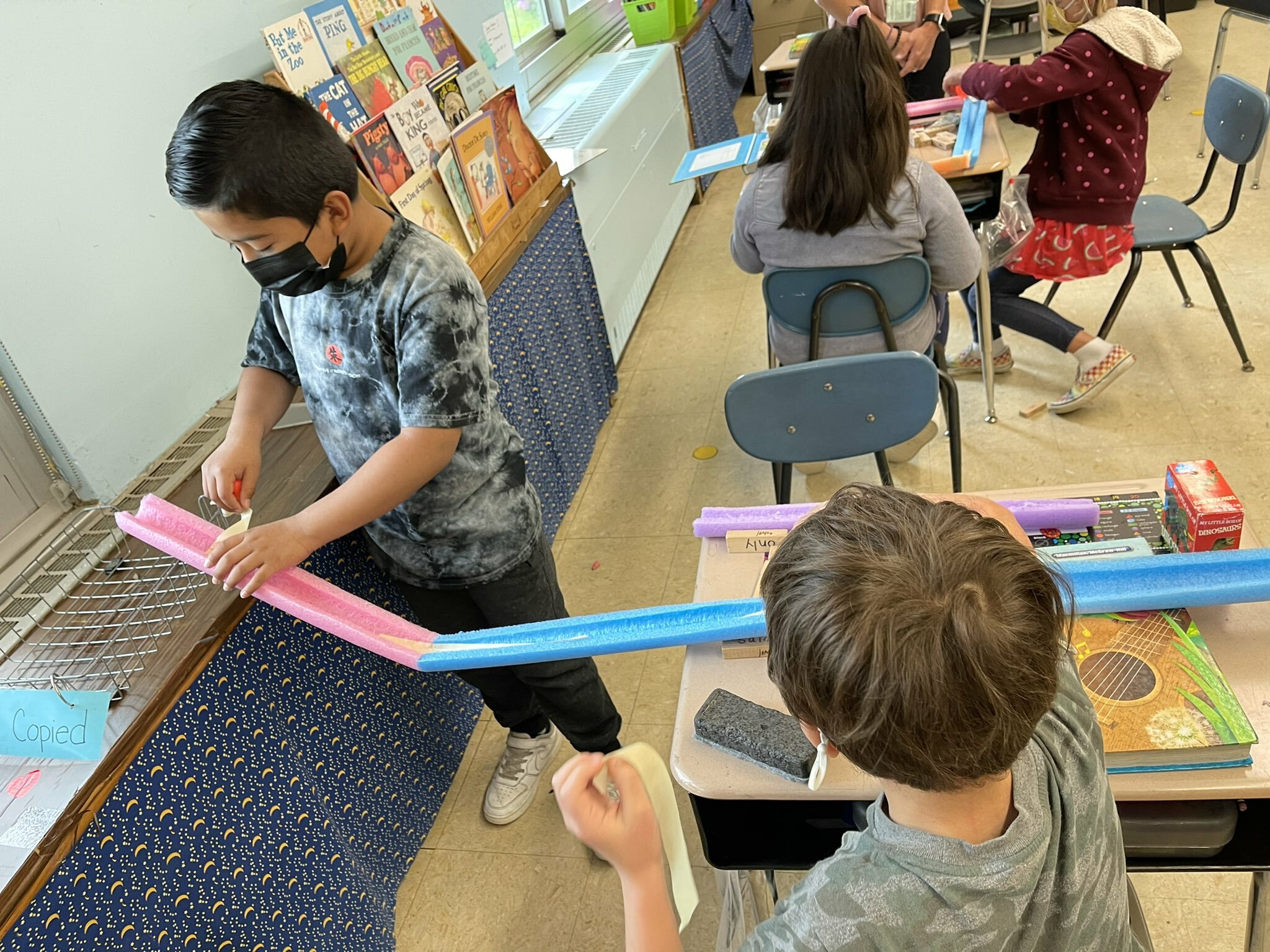 Hampton Bays Elementary School second graders learned how to engineer and construct ramps following a virtual visit with Brookhaven National Laboratory. During the session, the students enjoyed using pool noodles and other items found in their classroom to build the perfect ramp.