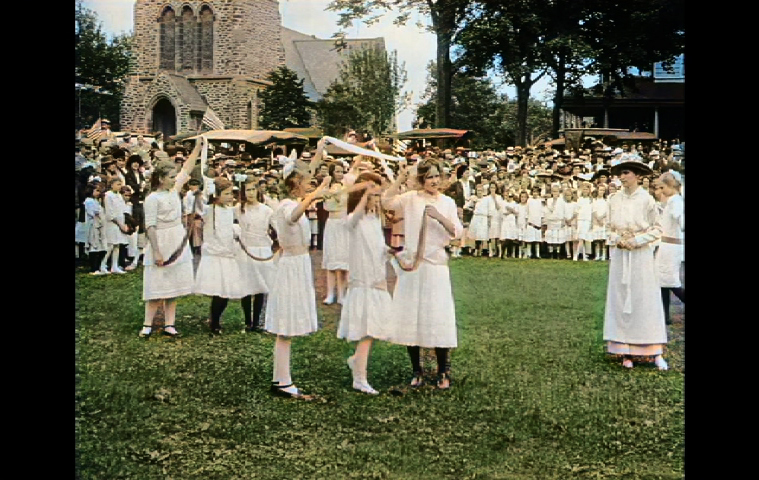 Girls dancing in a Pathé News newsreel of East Hampton’s Fourth of July parade in 1915.