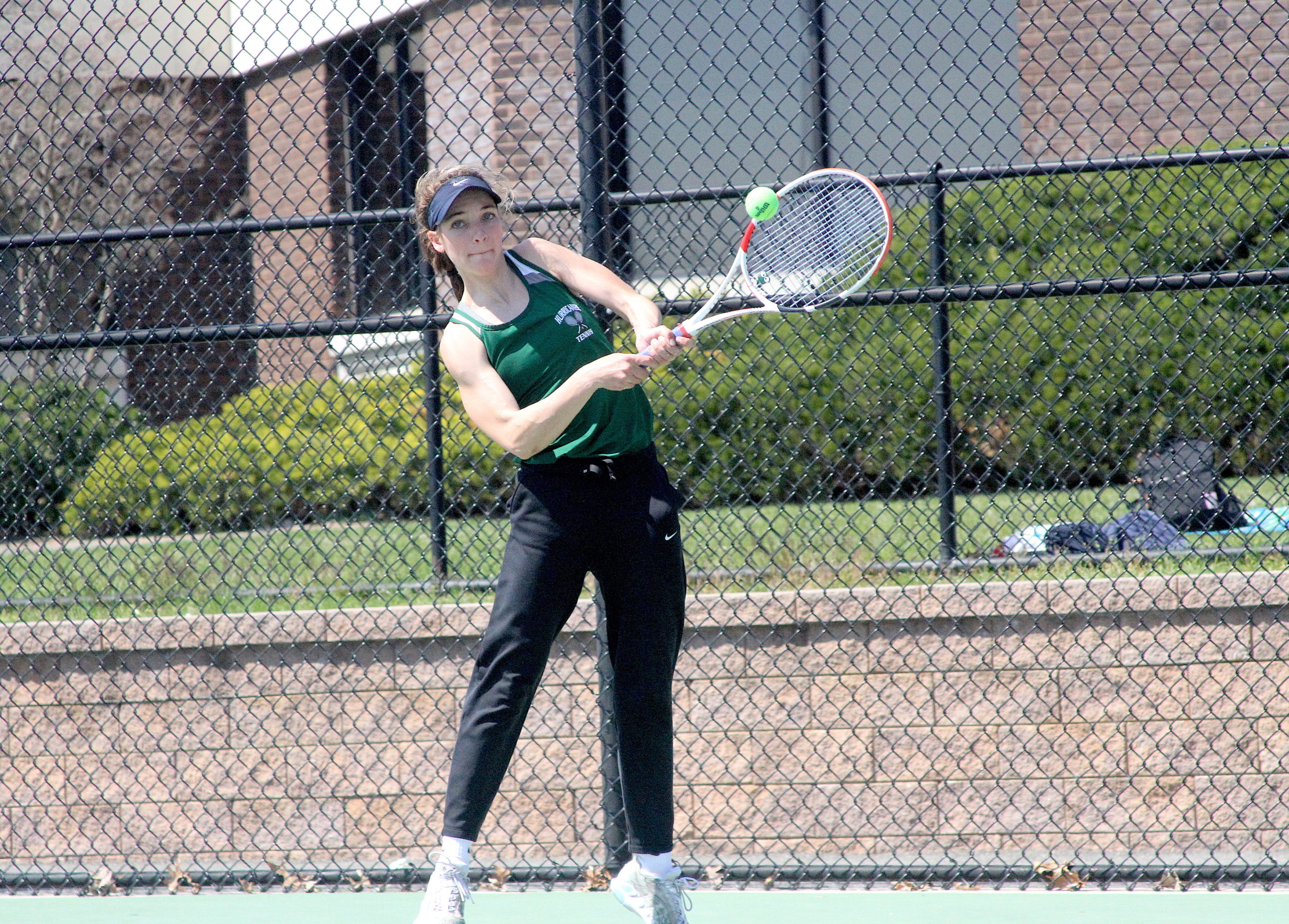Westhampton Beach rising senior Rose Hayes connects with a serve.